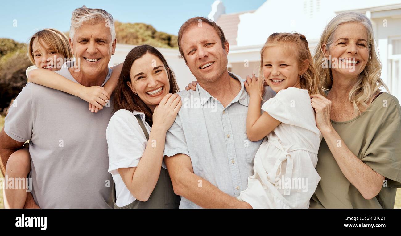 Portrait, big family and happy at house, bonding and funny laugh together. Face of grandparents, children and mother with father, smile and senior man Stock Photo