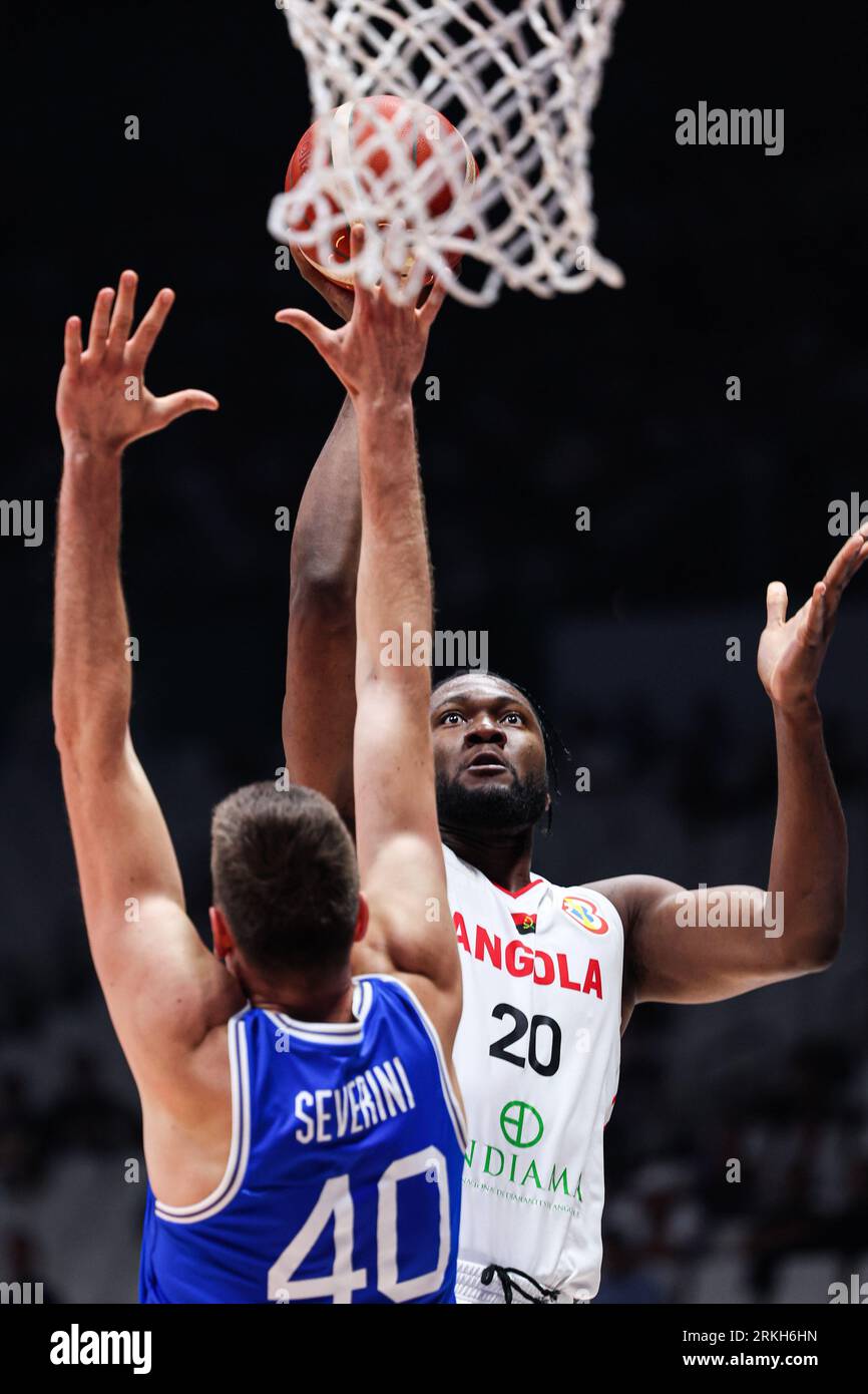 Manila, Philippines. 25th Aug, 2023. Bruno Fernando (R) of Angola shoots during the group A first round match between Angola and Italy at the FIBA World Cup 2023 in Manila, the Philippines, Aug. 25, 2023. Credit: Wu Zhuang/Xinhua/Alamy Live News Stock Photo