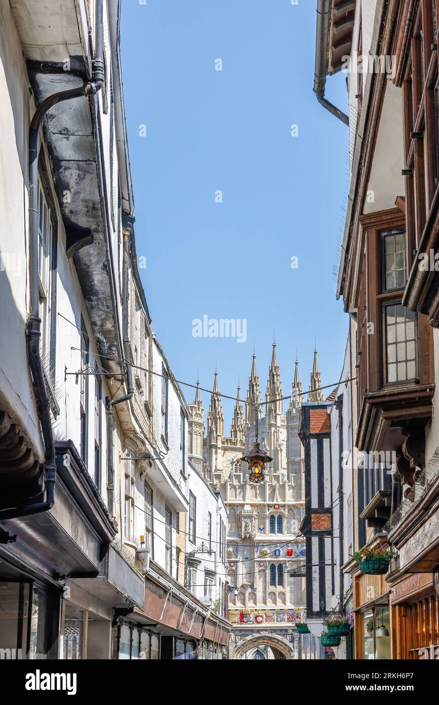 View of Historical Canterbury city center with the access gate to the Canterbury Cathedral in the background Stock Photo