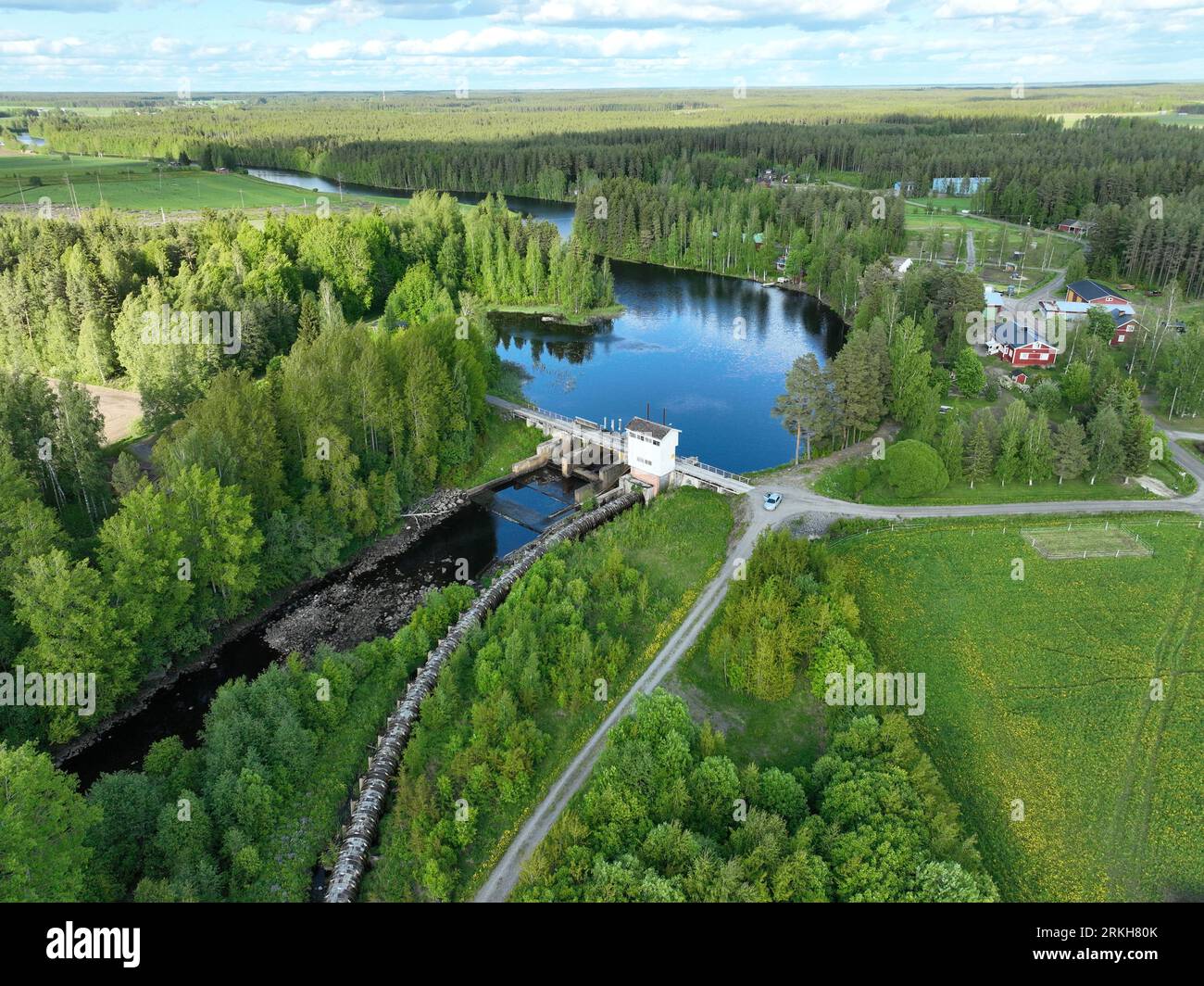 An aerial view of a lake in lush green landscape Stock Photo - Alamy