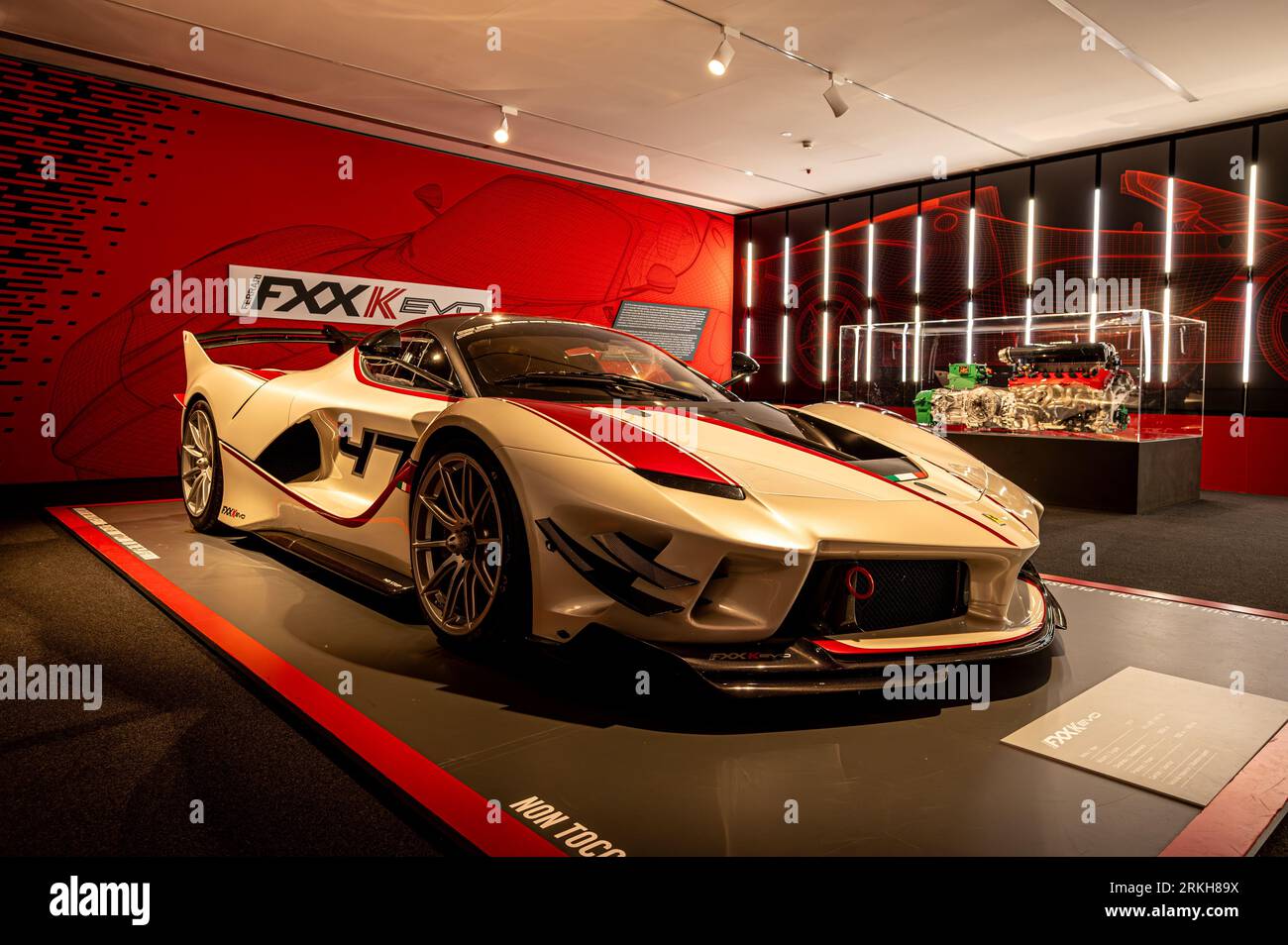 A Ferrari sportscar displayed in a museum showroom in Italy. Stock Photo