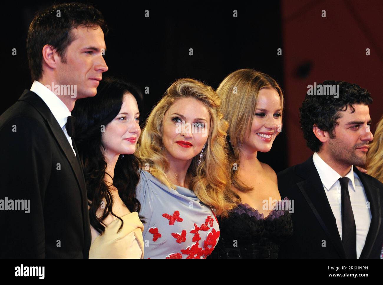 Bildnummer: 55880359  Datum: 01.09.2011  Copyright: imago/Xinhua (110901) -- VENICE, Sept. 1, 2011 (Xinhua) -- U.S. pop star and director Madonna (C) and cast members pose on the red carpet before the premiere of her new film W.E. at the 68th Venice International Film Festival in Venice, Italy, Sept. 1, 2011. (Xinhua/Wang Qingqin) ITALY-VENICE-FILM FESTIVAL-MADONNA PUBLICATIONxNOTxINxCHN People Film Entertainment Kultur 68 Filmfestspiele Venedig Filmpremiere x0x xtm premiumd 2011 quer WE Musik     55880359 Date 01 09 2011 Copyright Imago XINHUA  Venice Sept 1 2011 XINHUA U S Pop Star and Direc Stock Photo