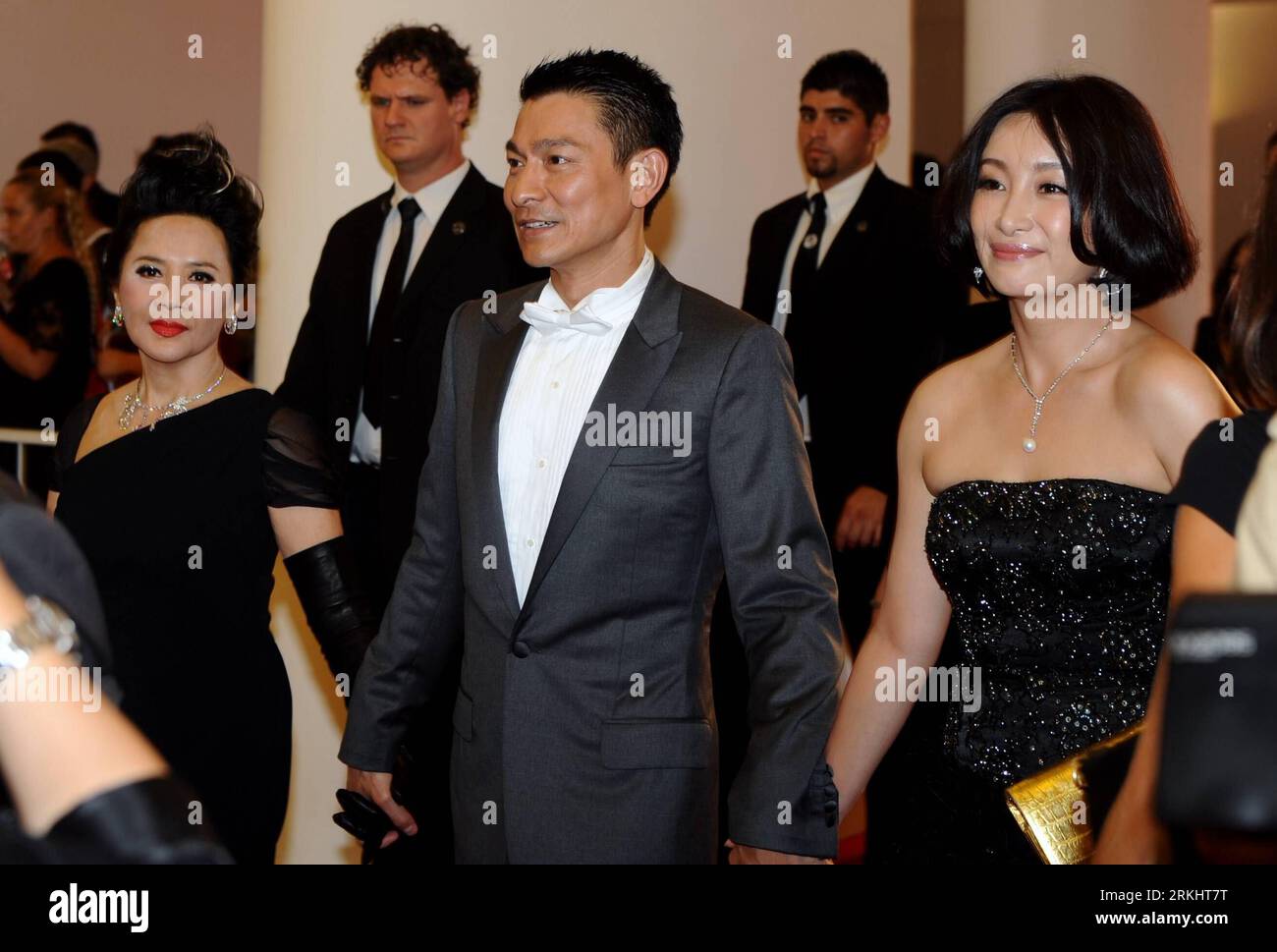 Bildnummer: 55896882  Datum: 05.09.2011  Copyright: imago/Xinhua (110906) -- VENICE, Sept. 6, 2011 (Xinhua) -- Actors Andy Lau (C), Deanie Yip (L) and Qin Hailu arrive for the premiere of the Chinese Hong Kong film Taojie (A Simple Life) at the 68th Venice International Film Festival in Venice, Italy, Sept. 5, 2011. (Xinhua/Wang Qingqin) (djj) ITALY-VENICE-FILM FESTIVAL-TAOJIE-PREMIERE PUBLICATIONxNOTxINxCHN People Film Kultur 68 Filmfestival Venedig Entertainment Filmpremiere x0x xtm premiumd 2011 quer      55896882 Date 05 09 2011 Copyright Imago XINHUA  Venice Sept 6 2011 XINHUA Actors Andy Stock Photo