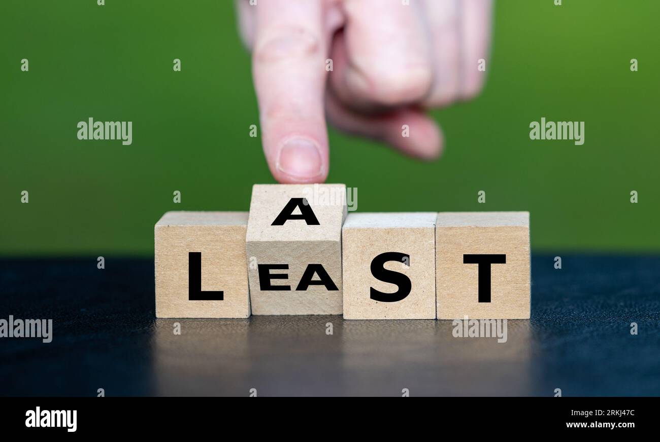 Wooden cubes form the expression 'last but not least'. Stock Photo