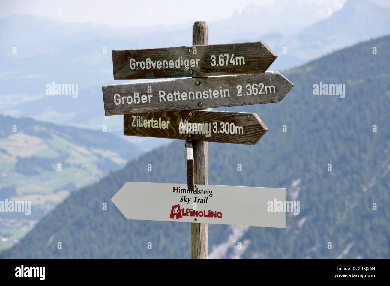 Söll, Austria, August 6, 2013. Tourist Sign with mountains behind. Stock Photo
