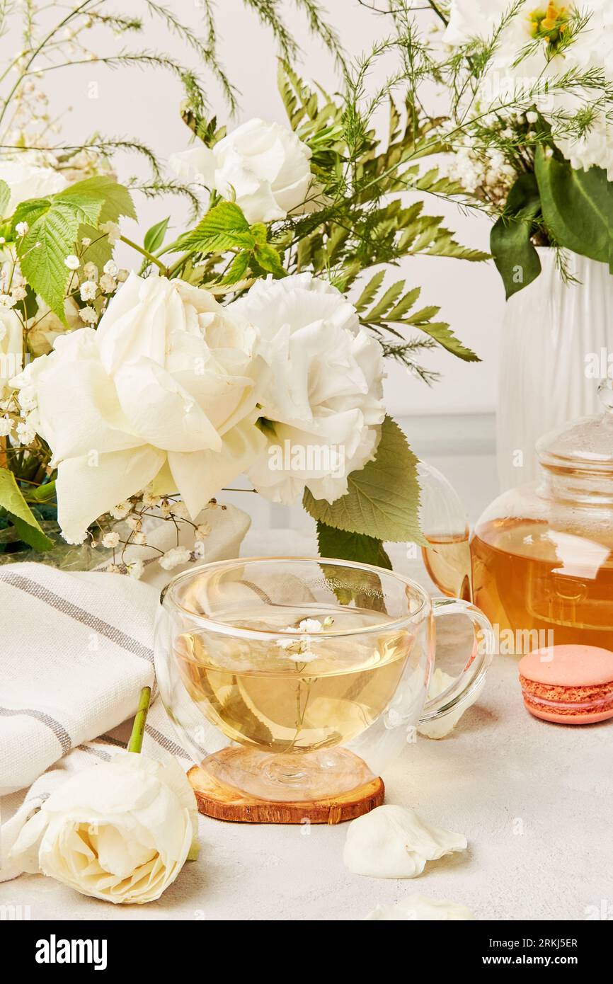 Aesthetic green tea cup, herbal tea in biophilic interior. Natural