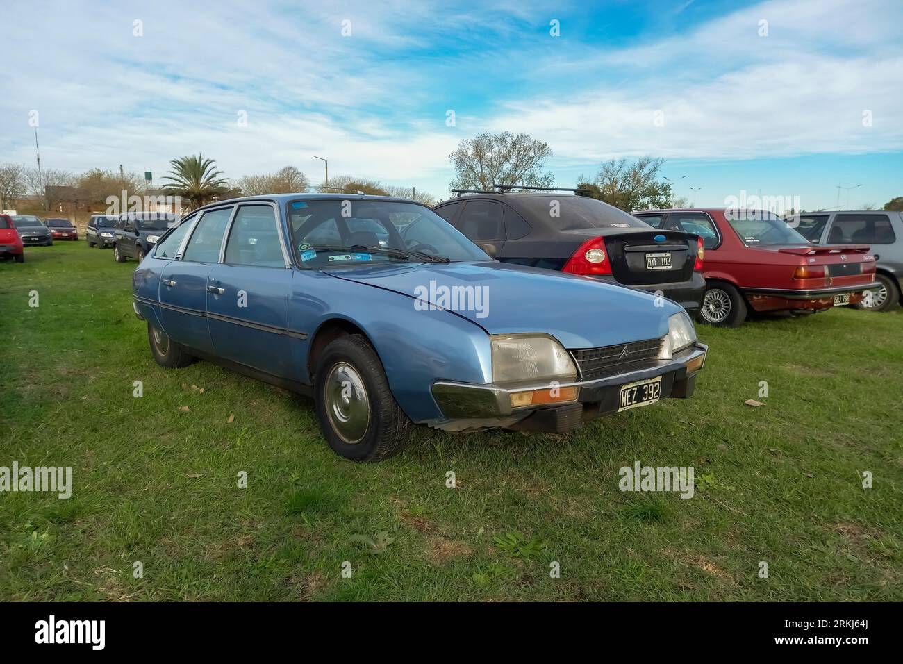 old blue executive Citroen CX fastback four door sedan parked on the lawn. Classic car show Stock Photo