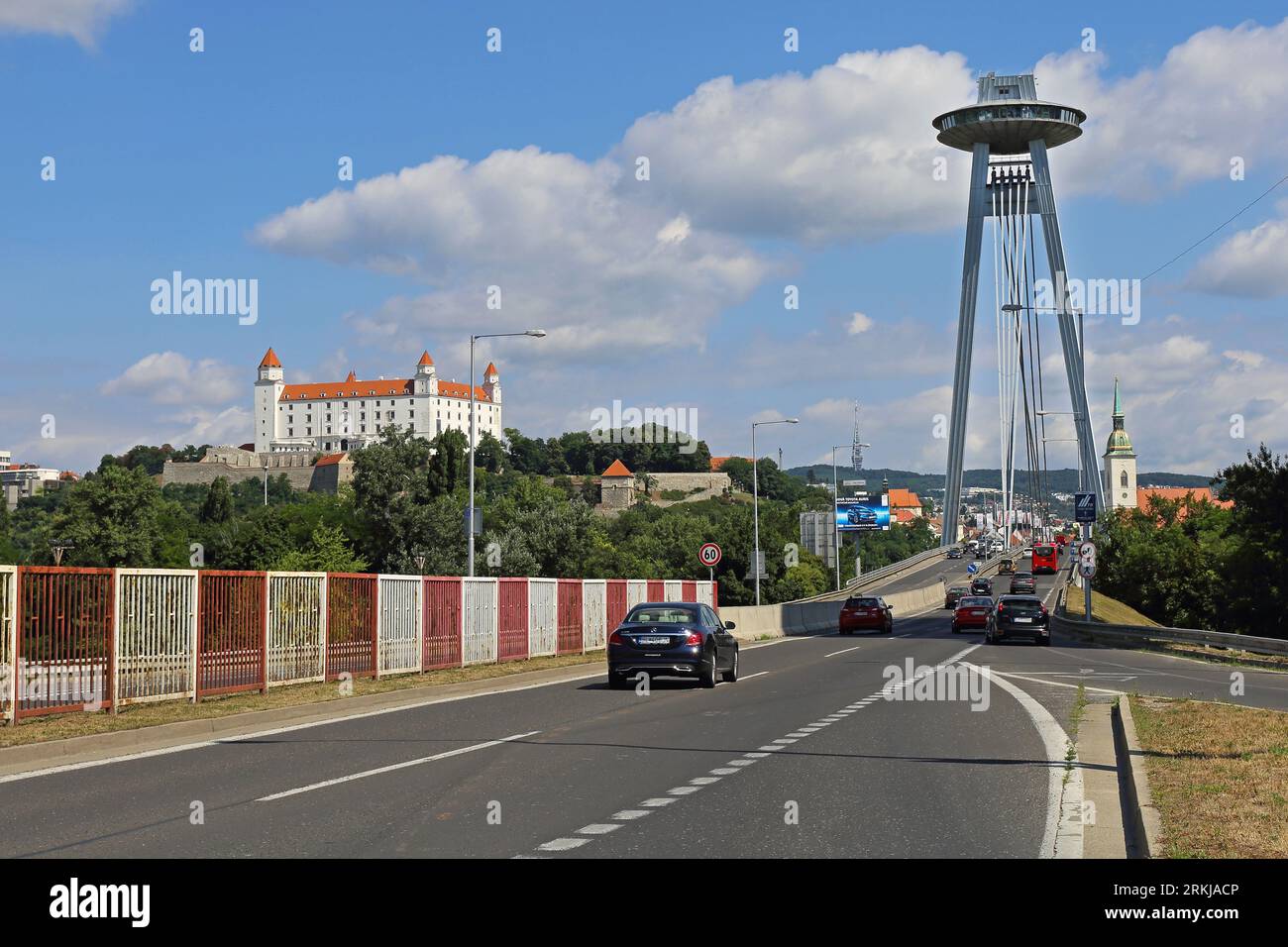 Bratislava, Slovakia - July 10, 2015: Famous SNP Bridge With UFO Restaurant on Top of Pylon in Capital City Summer Day. Stock Photo