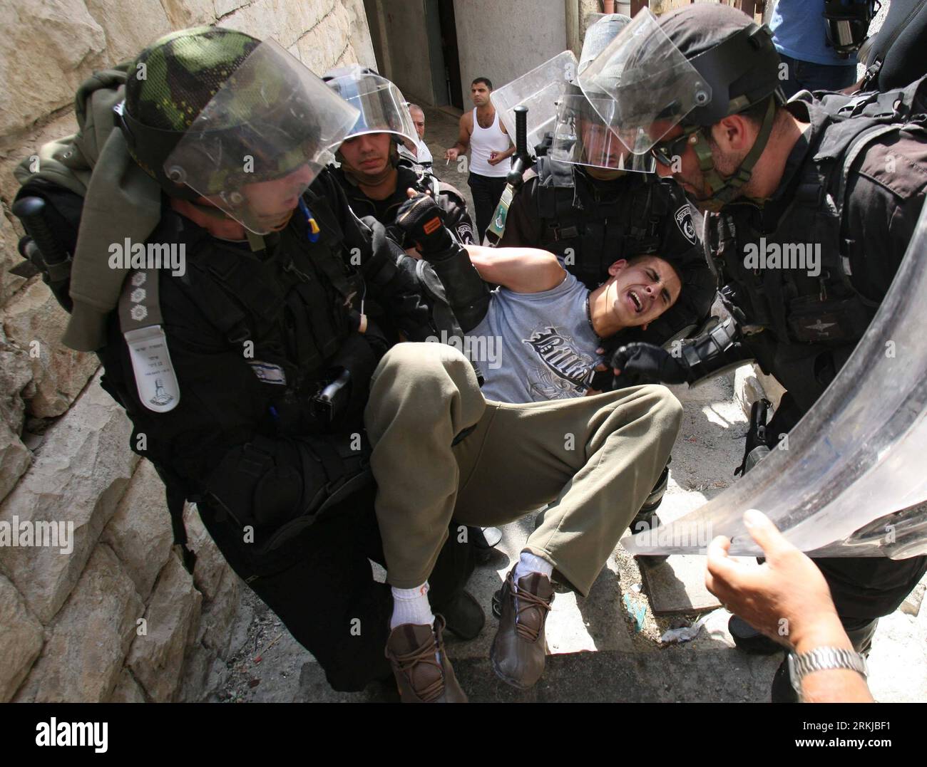 Israeli border police detain palestinian hi-res stock