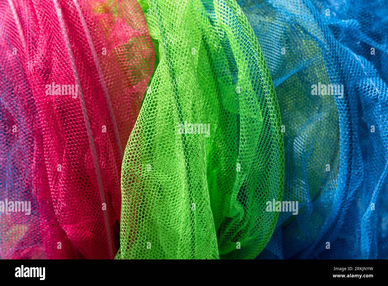 Colourful fishing nets for kids Stock Photo - Alamy