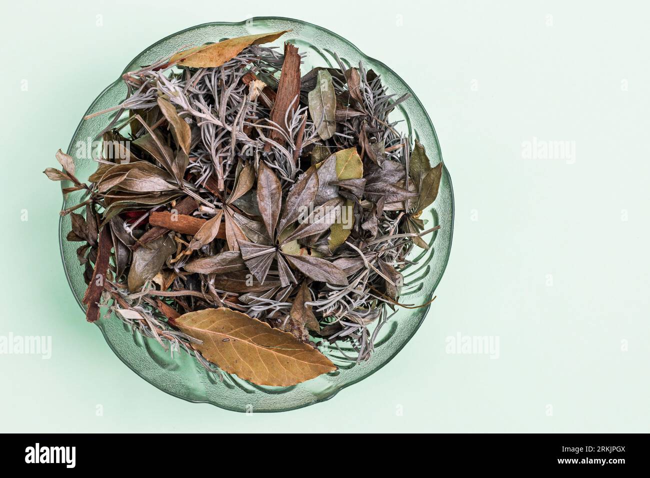 A simple glass bowl of dried natural potpourri photographed from above