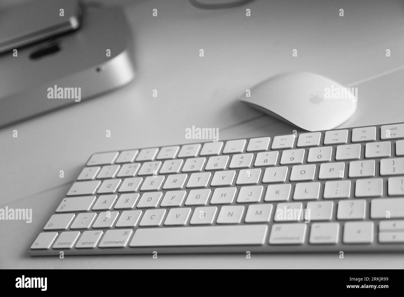 Business, Office, Computers, Apple Mac Mini with bluetooth keyboard and mouse. Stock Photo