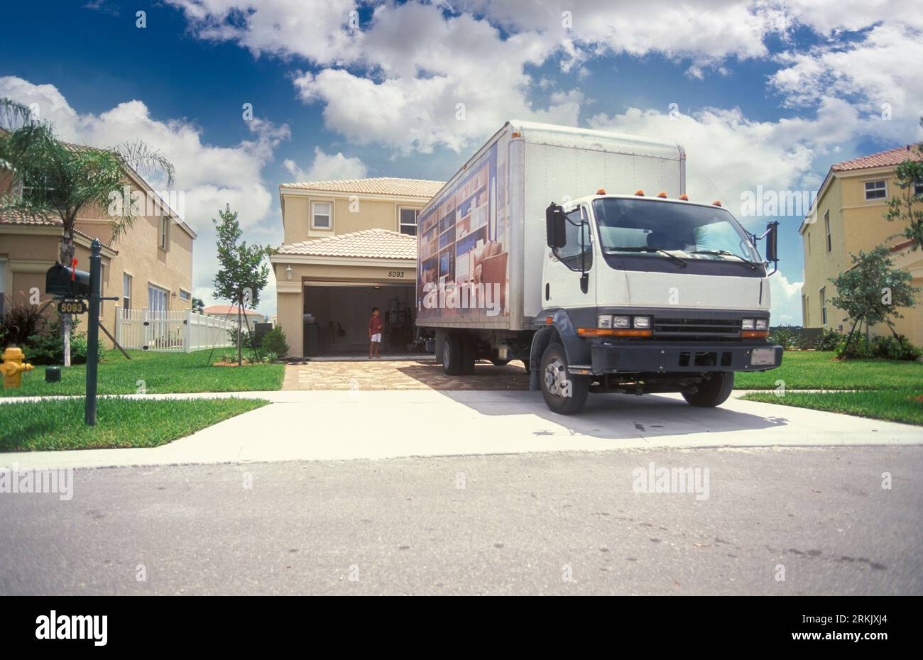 Moving truck parked in from of a house, Miramar, Florida Stock Photo