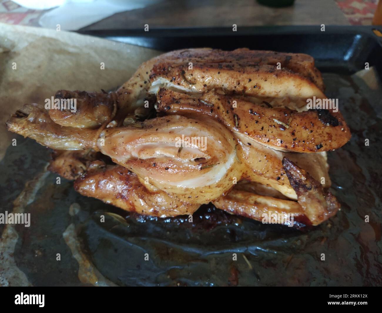 big chicken dish on table Stock Photo