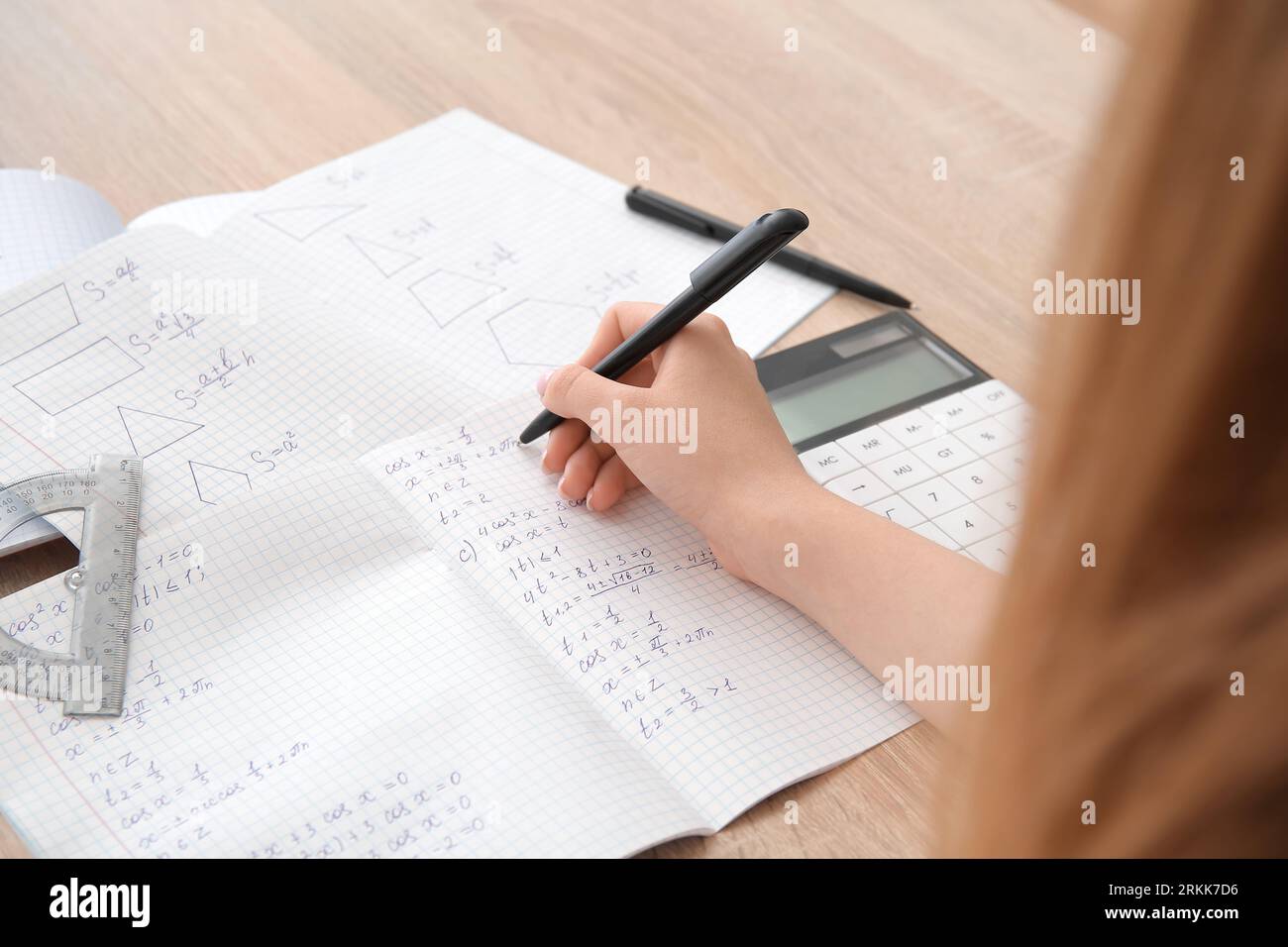 Woman writing maths formulas hi-res stock photography and images - Alamy