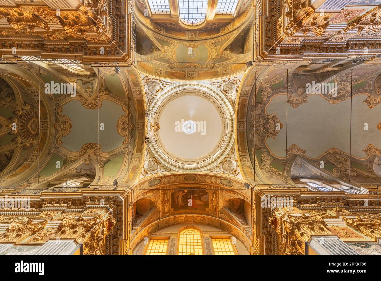 GENOVA, ITALY - MARCH 8, 2023: The cupola and ceiling of baroque church Chiesa dei Santi Vittore e Carlo. Stock Photo