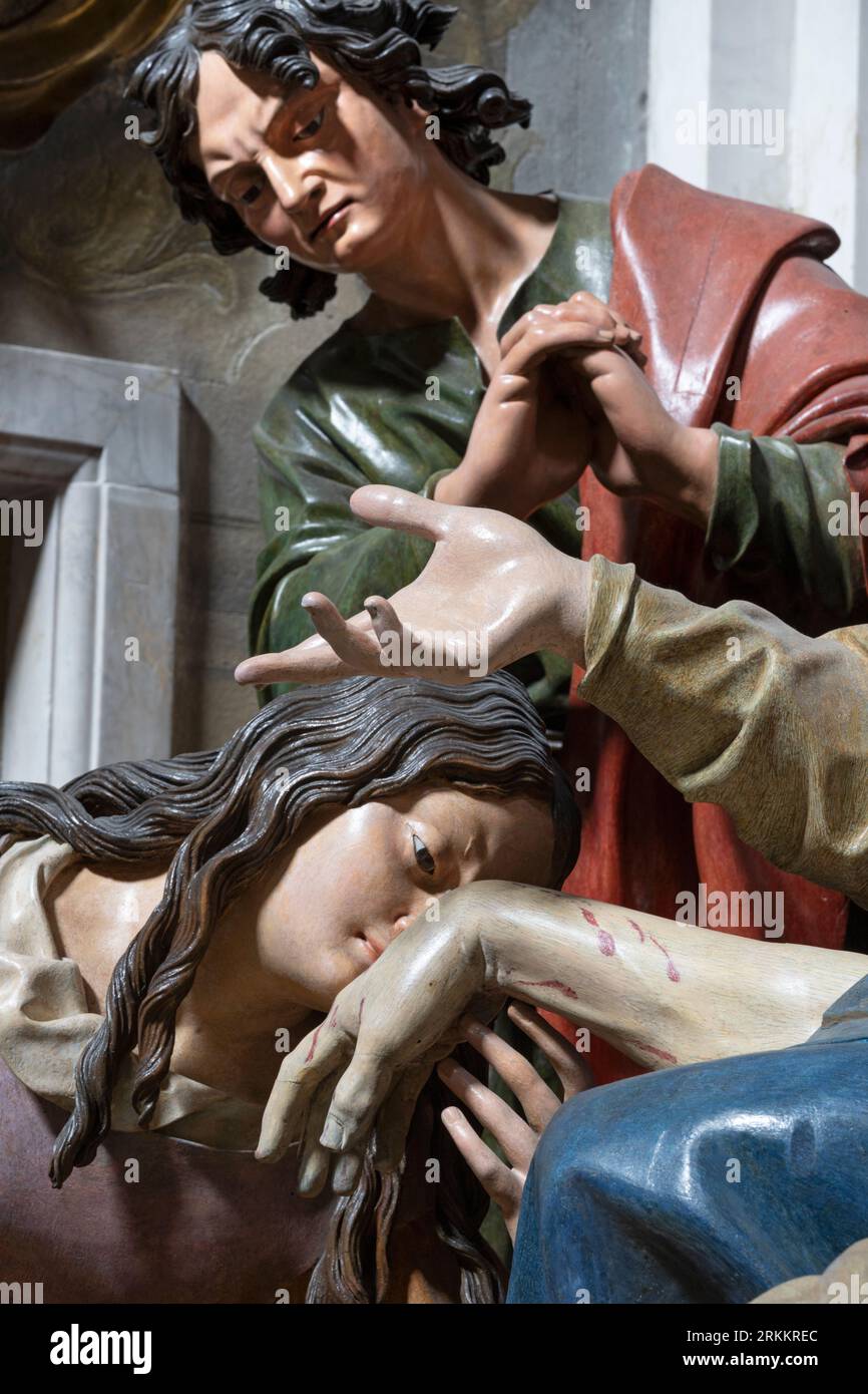 GENOVA, ITALY - MARCH 8, 2023: The detail of carved polychrome sculptural group of Pieta in the church Chiesa di san Filippo Neri Stock Photo