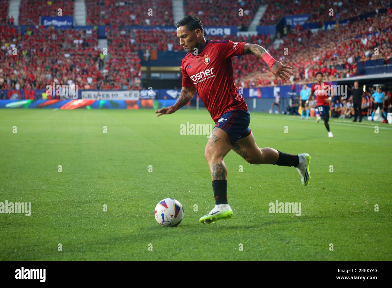 August 24, 2023, Pamplona, Foral Community of Navarre, Spain: Pamplona, Spain, 24th August, 2023: CA Osasuna's player Ezequiel Avila (9) with the ball during the first leg match of the previous round of the UEFA Europa Conference League 2023-24 between CA Osasuna and Club Brugge in the El Sadar Stadium, in Pamplona, on August 24, 2023. (Credit Image: © Alberto Brevers/Pacific Press via ZUMA Press Wire) EDITORIAL USAGE ONLY! Not for Commercial USAGE! Stock Photo