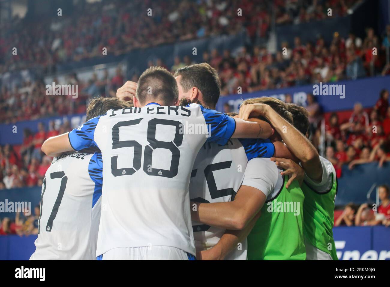 August 24, 2023, Pamplona, Foral Community of Navarre, Spain: Pamplona, Spain, 24th August, 2023: Club Brugge players hug at the second goal during the first leg match of the 2023-24 UEFA Europa Conference League Preliminary Round between CA Osasuna and Club Brugge at the Estadio de El Sadar, in Pamplona, on August 24, 2023. (Credit Image: © Alberto Brevers/Pacific Press via ZUMA Press Wire) EDITORIAL USAGE ONLY! Not for Commercial USAGE! Stock Photo