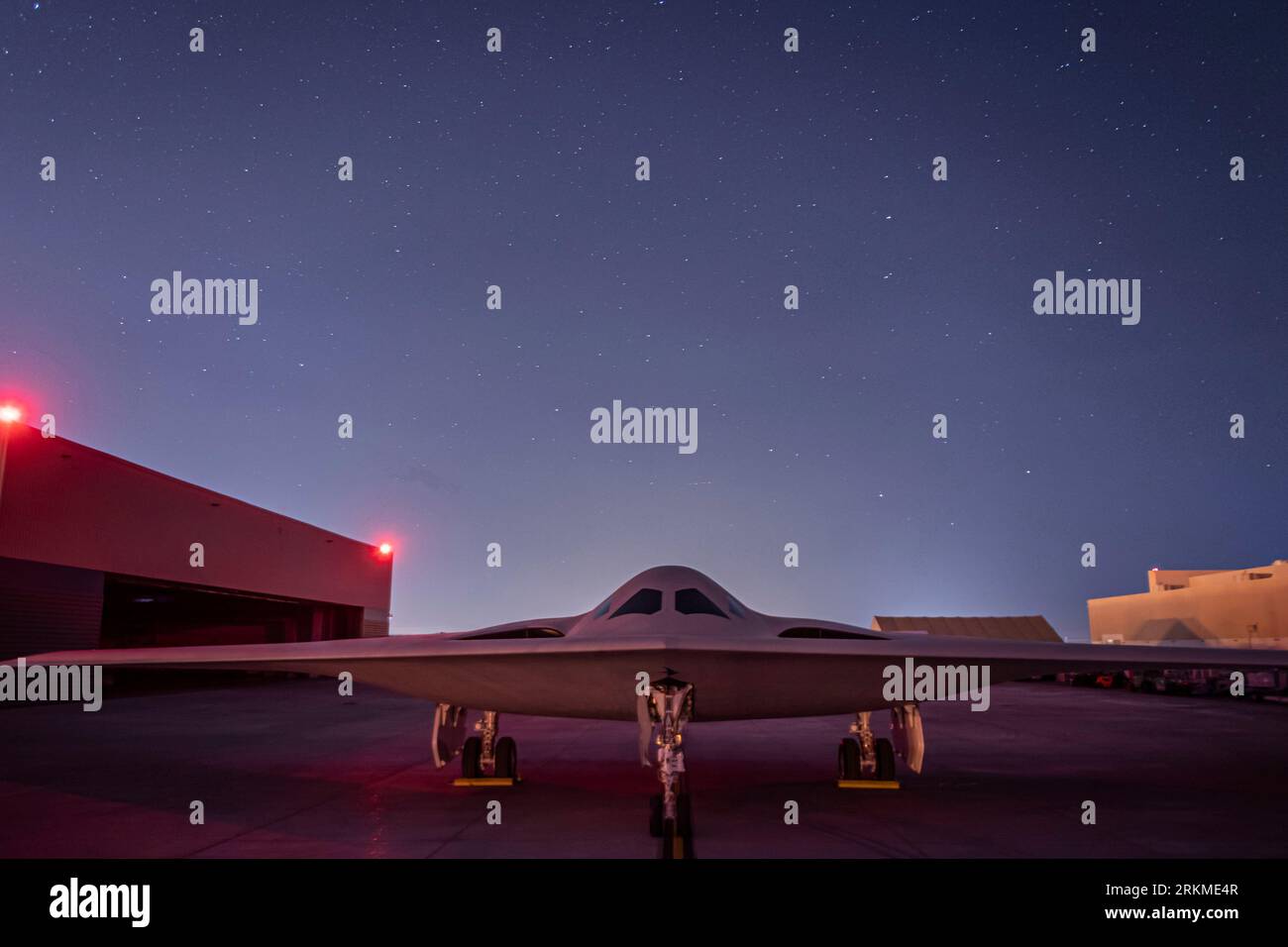 Palmdale, United States. 29 November, 2022. The U.S. Air Force B-21 Raider stealth strategic bomber aircraft under the night sky at Plant 42 on Edwards Air Force Base, November 29, 2022 in Palmdale, California.  Credit: USAF/U.S. Air Force Photo/Alamy Live News Stock Photo
