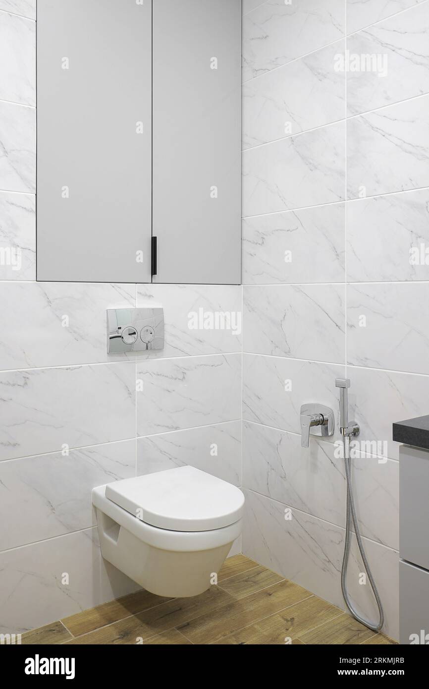 White toilet bowl in a modern bathroom interior Stock Photo - Alamy
