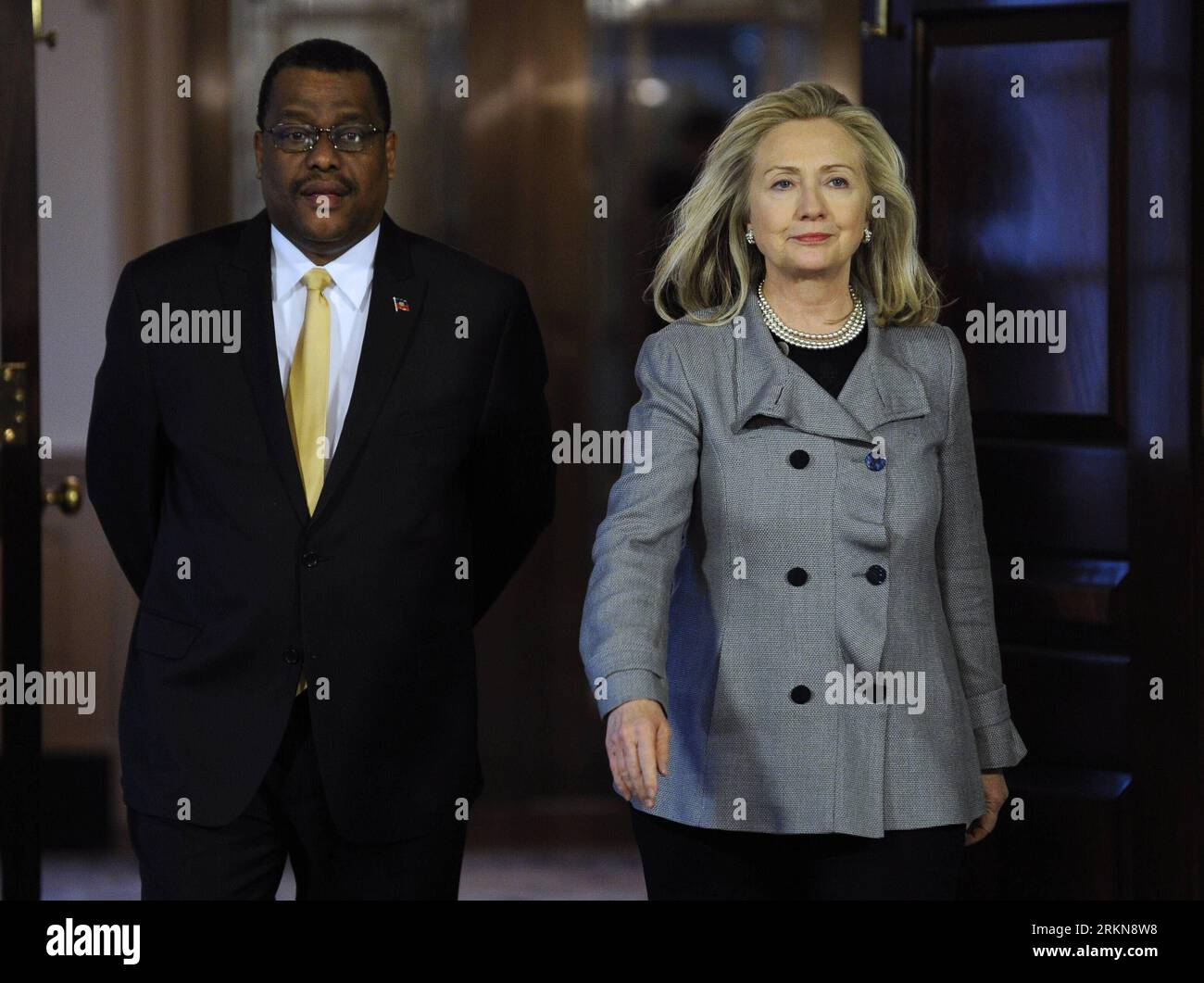 Haiti Prime Minister Garry Conille, left, and Kenya's President
