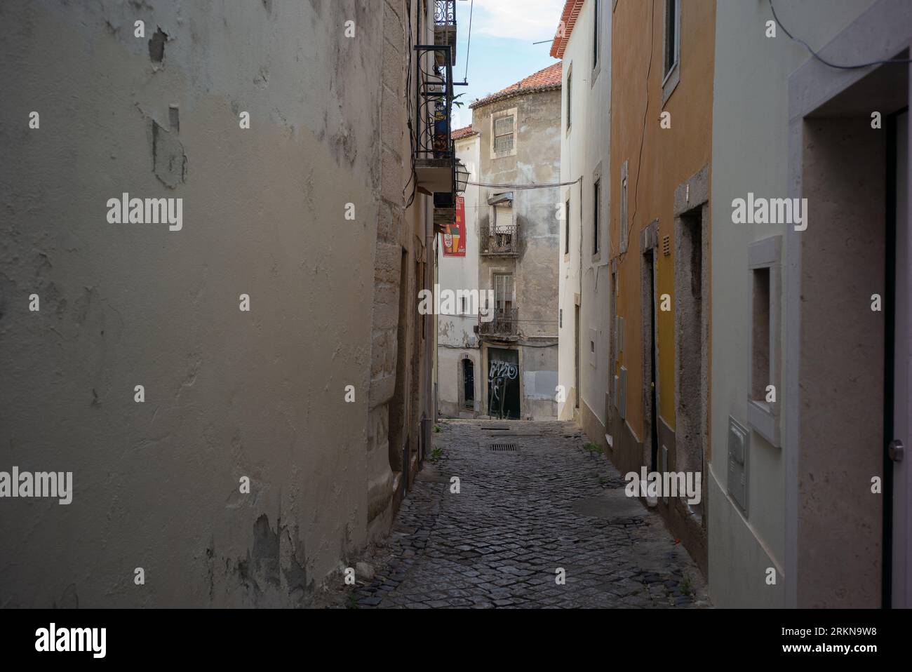 view of the streets of the Alfama neighborhood is one of the oldest and most touristic neighborhoods in Lisbon. August 25, 2023 Portugal Stock Photo
