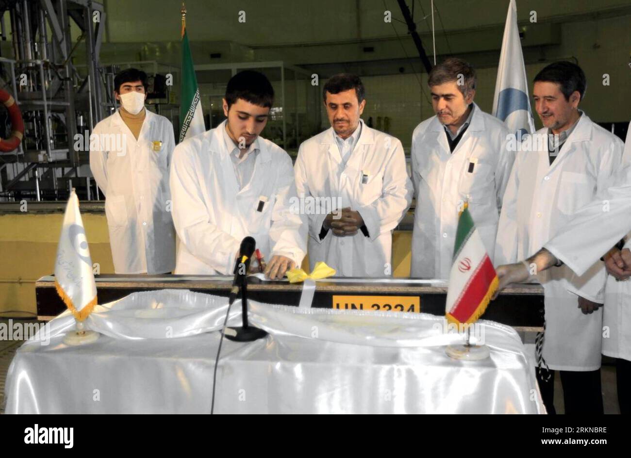 Bildnummer: 57076893  Datum: 15.02.2012  Copyright: imago/Xinhua (120215)-- TEHRAN, Feb. 15, 2012 (Xinhua) -- Iranian President Mahmoud Ahmadinejad (3rd, L) attends an unveiling ceremony of a new generation of centrifuge for uranium enrichment in Tehran, Iran, Feb. 15, 2012. In the ceremony, Ahmadinejad, symbolically, fed a home-made fuel rod made out of 20-percent enriched uranium into the core of Tehran Research Reactor. (Xinhua/Official Website of the Iranian President) IRAN-TEHRAN-NUCLEAR-AHMADINEJAD PUBLICATIONxNOTxINxCHN People Politik AKW Zentrifuge Nukleartechnik Atomprogramm Atomstrei Stock Photo