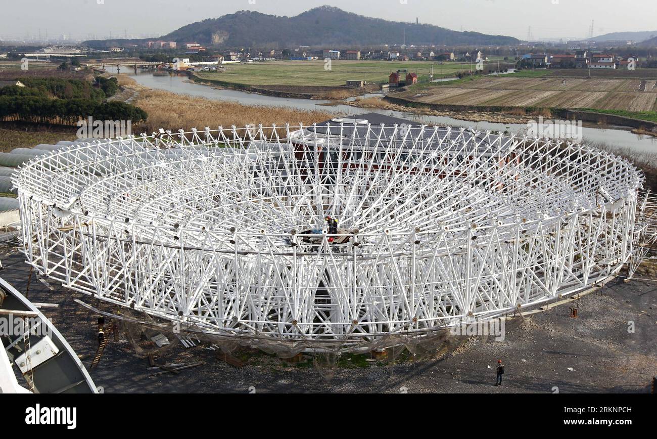 Bildnummer: 57372781  Datum: 12.03.2012  Copyright: imago/Xinhua (120312) -- SHANGHAI, March 12, 2012 (Xinhua) -- Photo taken on March 12, 2012 shows the radio telescope under construction in Shanghai, east China. The 65-meter-diameter telescope, a form of directional radio antenna used in radio astronomy, will be used in tracking and collecting data from satellites and space probes including Chinese astronomical projects like Chang e lunar probe, YH-1 Mars exploration and other deep space explorations. The antenna structure of the telescope is scheduled to be finished by September 2012 and th Stock Photo