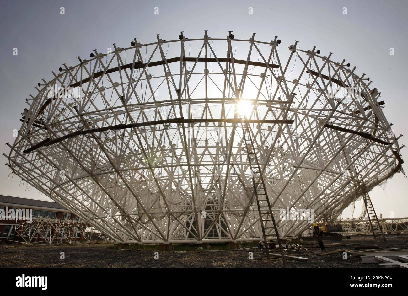 Bildnummer: 57372780  Datum: 12.03.2012  Copyright: imago/Xinhua (120312) -- SHANGHAI, March 12, 2012 (Xinhua) -- Photo taken on March 12, 2012 shows the radio telescope under construction in Shanghai, east China. The 65-meter-diameter telescope, a form of directional radio antenna used in radio astronomy, will be used in tracking and collecting data from satellites and space probes including Chinese astronomical projects like Chang e lunar probe, YH-1 Mars exploration and other deep space explorations. The antenna structure of the telescope is scheduled to be finished by September 2012 and th Stock Photo