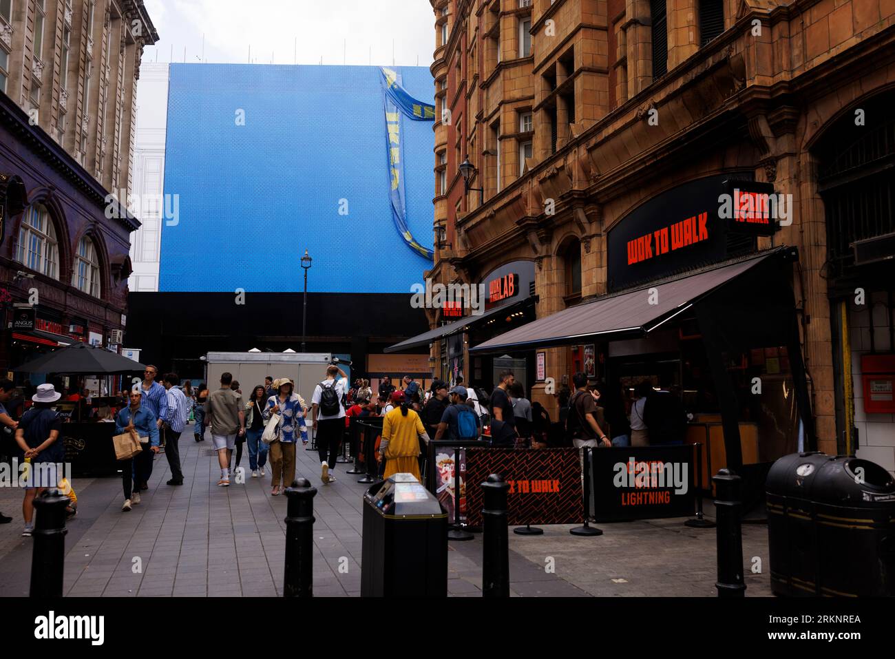 IKEA is set to open a store on Oxford Street in early 2024, the building is currently covered in scaffolding designed to look like a giant IKEA blue b Stock Photo