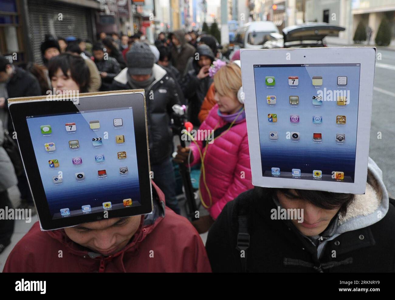 With their new apple ipad 3 hi-res stock photography and images
