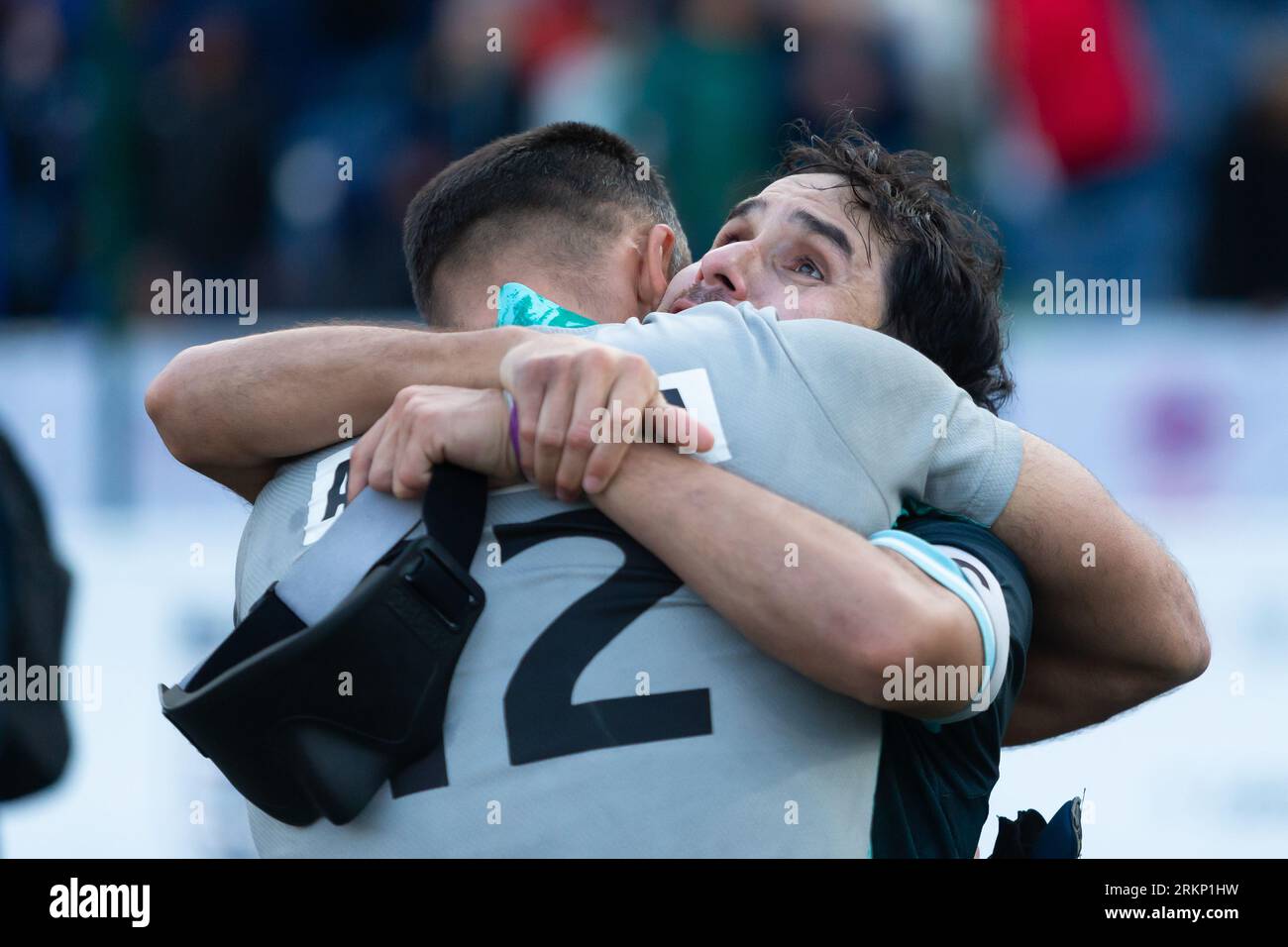 Birmingham, UK. 25th Aug, 2023. Argentina win the IBSA Blind Football World Cup final 2 - 1 on penalties against China at Birmingham University, 25th August, 2023. Deldo Angel gets a congratulatory hug from goalkeeper Muleck German as Argentina players celebrate winning after penalties. Credit: Peter Lopeman/Alamy Live News Stock Photo