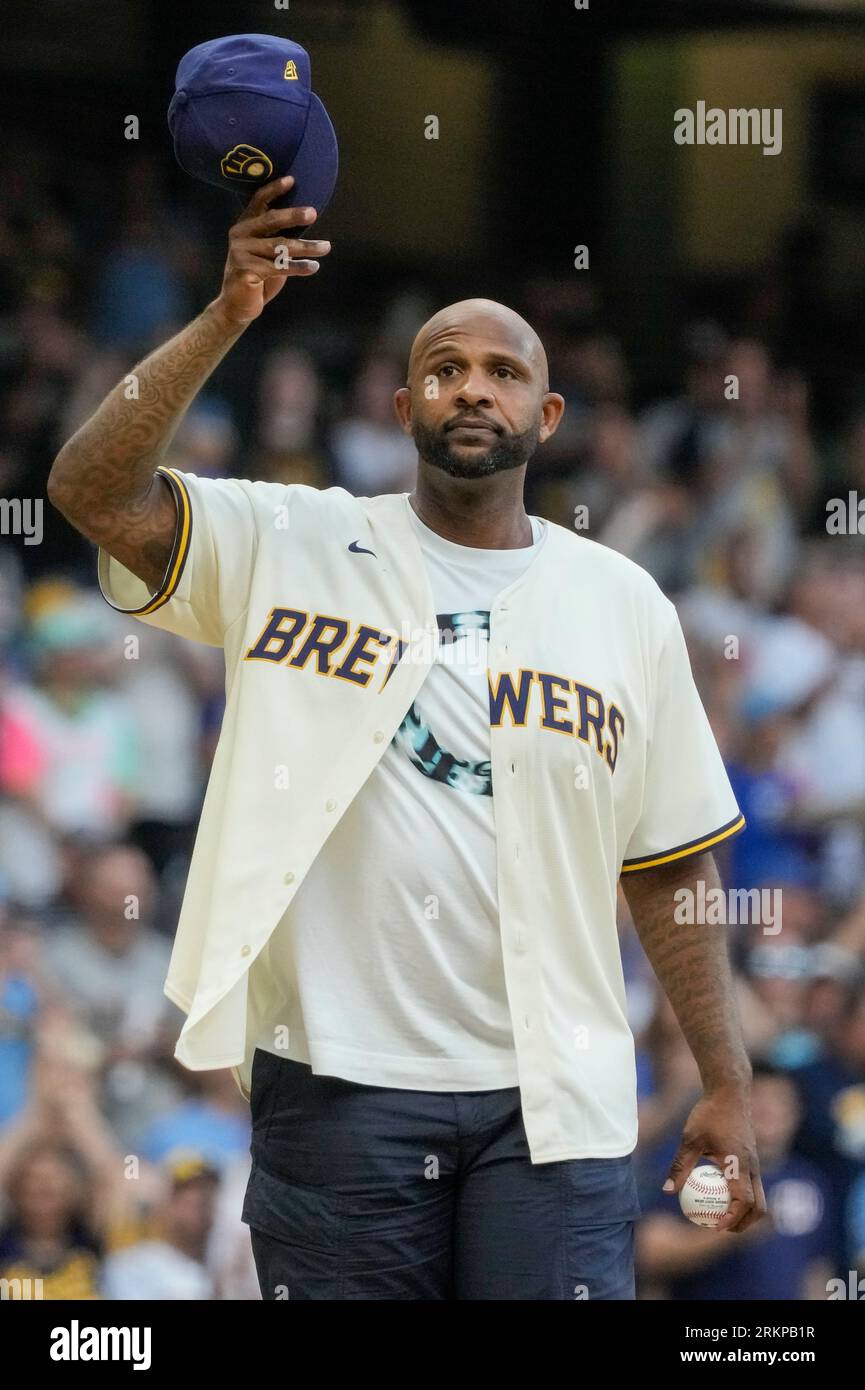 CC Sabathia throws a ceremonial first pitch before a baseball game