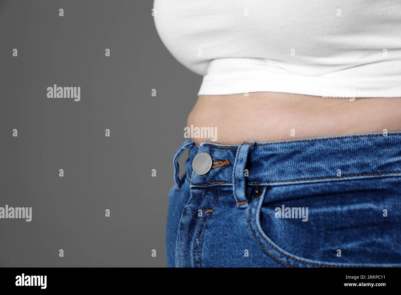 Woman wearing tight blue jeans hi-res stock photography and images - Alamy