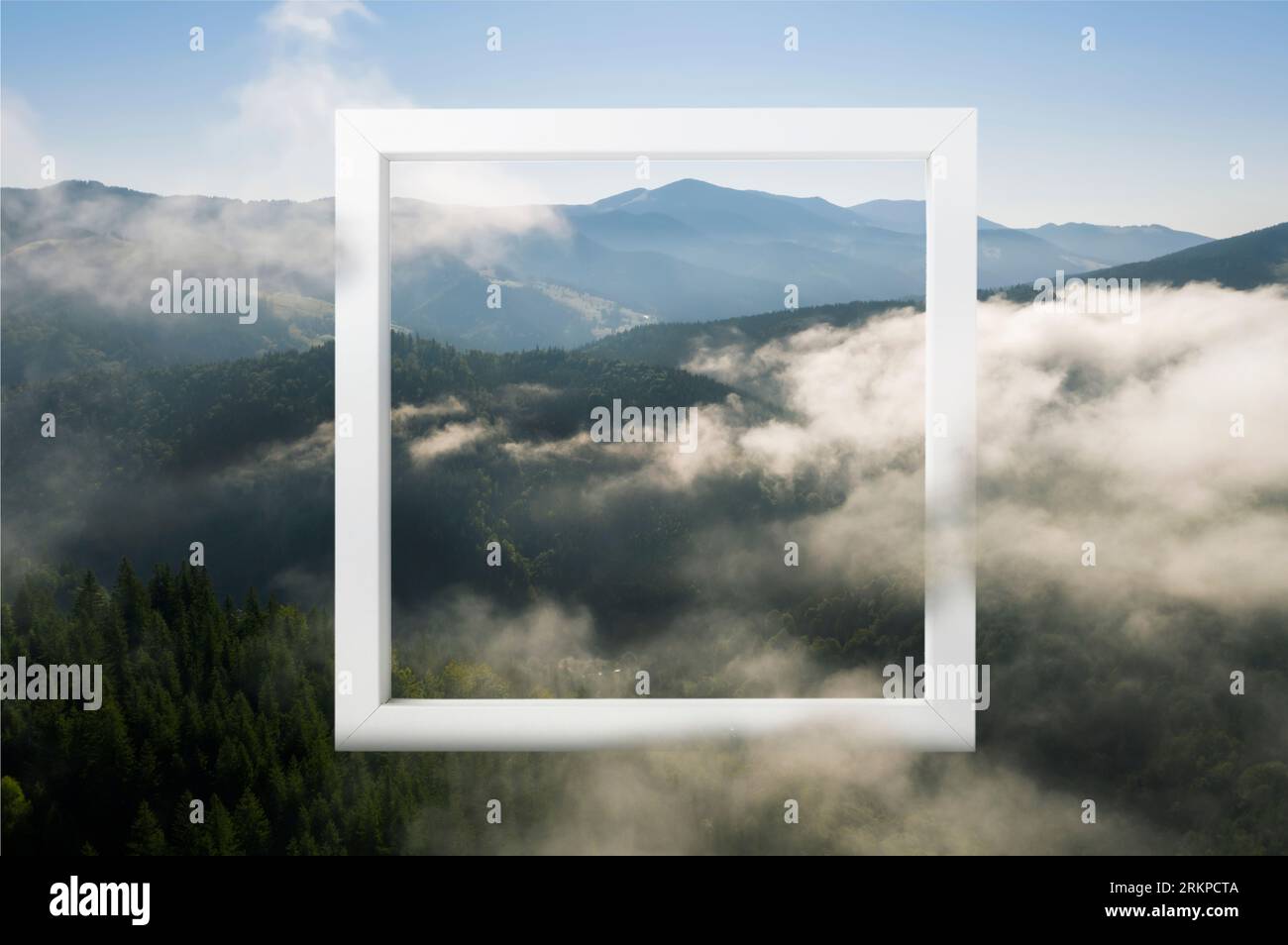 Wooden frame and beautiful mountains with fog in morning Stock Photo ...