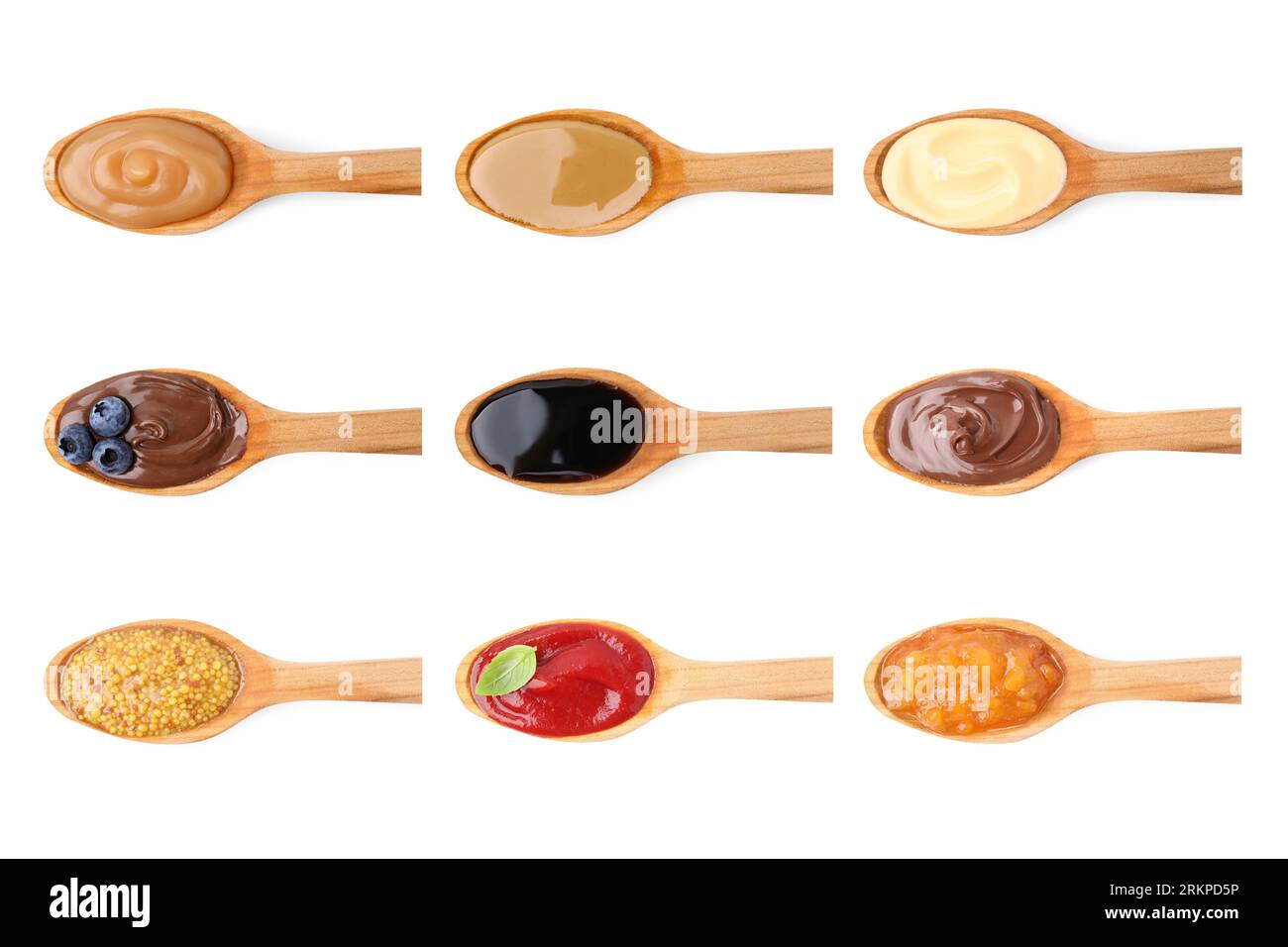 Food In Spoon Set of spoons with different food isolated on white, top view Stock ...