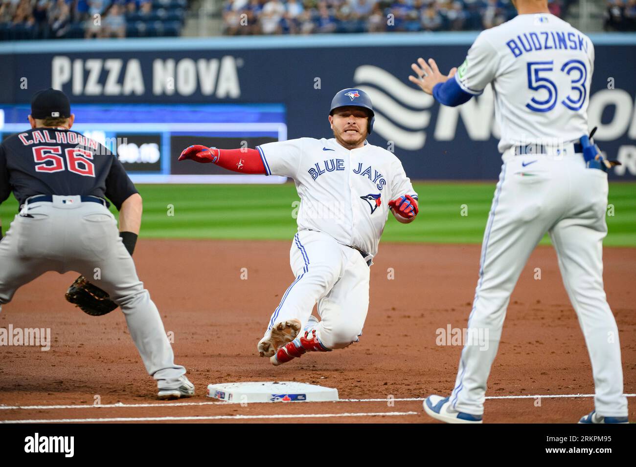 Toronto, Canada. 25th Aug, 2023. Toronto Blue Jays' Alejandro Kirk (30)  returns safely after rounding first base on a single against the Cleveland  Guardians during second inning MLB baseball action, in Toronto