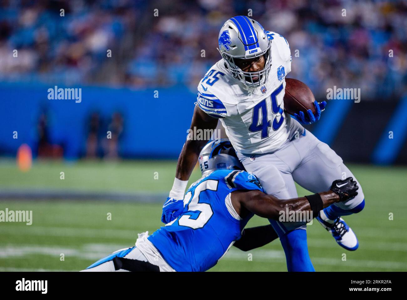 August 25, 2023: Detroit Lions fullback Jason Cabinda (45) tries to get by Carolina Panthers safety Xavier Woods (25) during the second quarter of the NFL matchup in Charlotte, NC. (Scott Kinser/Cal Sport Media) Stock Photo
