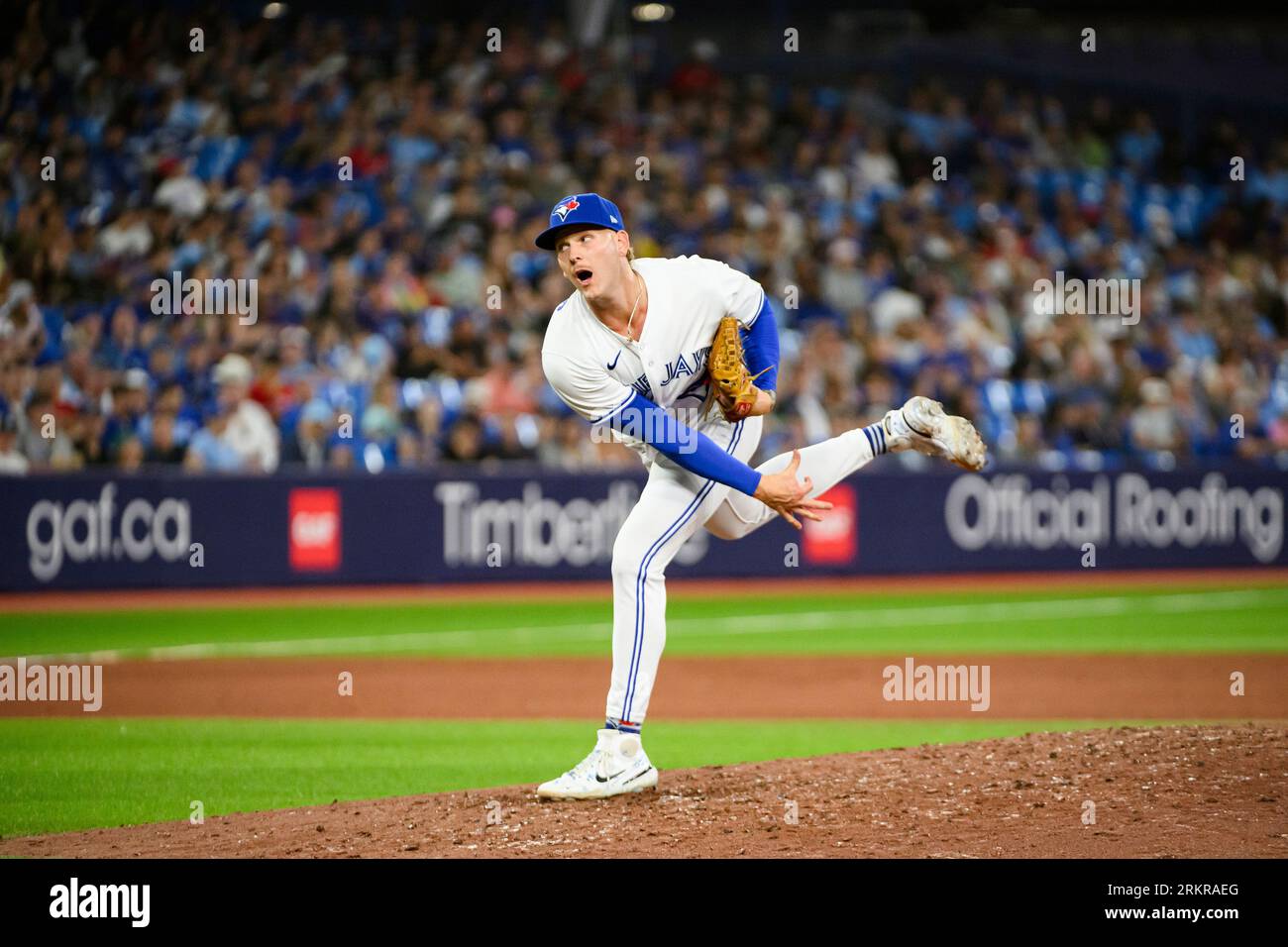 TORONTO, ON - AUGUST 25: Toronto Blue Jays Center field Kevin Pillar (11)  slides back to First during in the MLB game between the Philadelphia  Phillies and the Toronto Blue Jays at