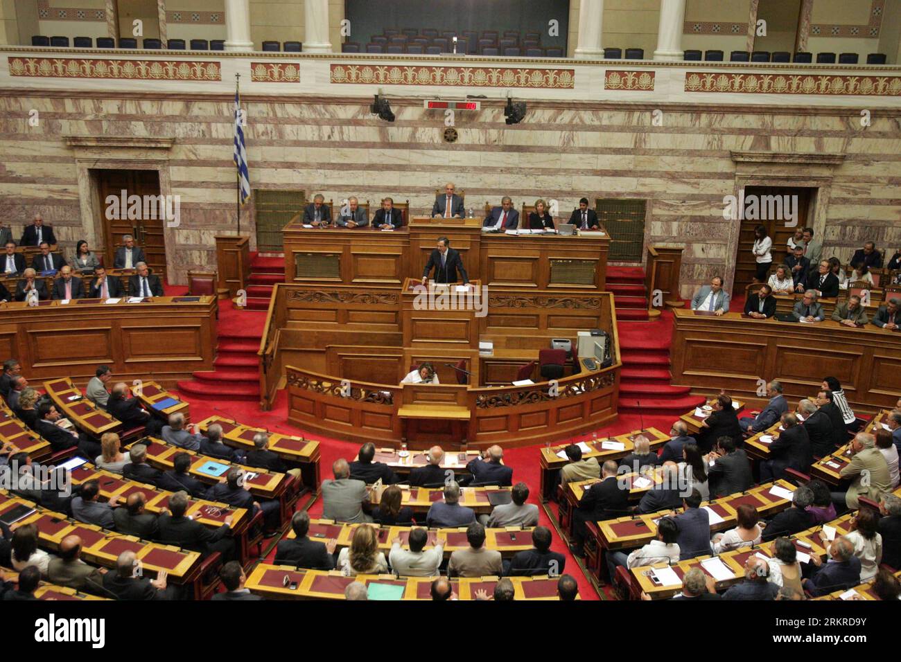 Bildnummer: 58203138  Datum: 06.07.2012  Copyright: imago/Xinhua (120706) -- ATHENS, July 6, 2012 (Xinhua) -- Greek Prime Minister Antonis Samaras (C) delivers his speech at the Greek parliament in Athens, Greece, on July 6, 2012. Greece s new three-party coalition government is ready to carry out long-delayed structural reforms, Samaras said Friday, as he acknowledged that the deficit reduction program has gone off target. (Xinhua/Marios Lolos) GREECE-GOVERNMENT-NEW PM PUBLICATIONxNOTxINxCHN People Politik premiumd xbs x0x 2012 quer      58203138 Date 06 07 2012 Copyright Imago XINHUA  Athens Stock Photo