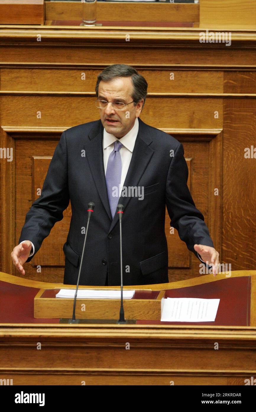 Bildnummer: 58203135  Datum: 06.07.2012  Copyright: imago/Xinhua (120706) -- ATHENS, July 6, 2012 (Xinhua) -- Greek Prime Minister Antonis Samaras delivers his speech at the Greek parliament in Athens, Greece, on July 6, 2012. Greece s new three-party coalition government is ready to carry out long-delayed structural reforms, Samaras said Friday, as he acknowledged that the deficit reduction program has gone off target. (Xinhua/Marios Lolos) GREECE-GOVERNMENT-NEW PM PUBLICATIONxNOTxINxCHN People Politik premiumd xbs x0x 2012 hoch      58203135 Date 06 07 2012 Copyright Imago XINHUA  Athens Jul Stock Photo