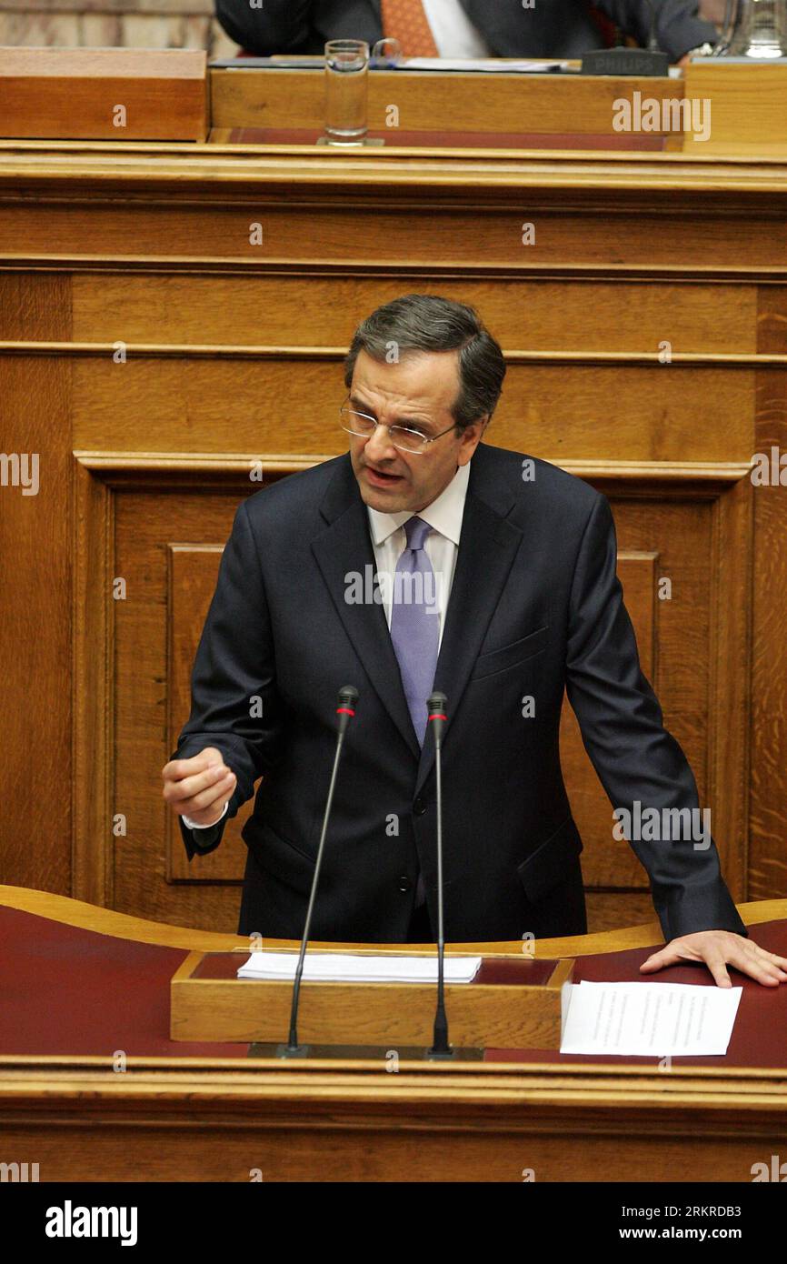 Bildnummer: 58203136  Datum: 06.07.2012  Copyright: imago/Xinhua (120706) -- ATHENS, July 6, 2012 (Xinhua) -- Greek Prime Minister Antonis Samaras delivers his speech at the Greek parliament in Athens, Greece, on July 6, 2012. Greece s new three-party coalition government is ready to carry out long-delayed structural reforms, Samaras said Friday, as he acknowledged that the deficit reduction program has gone off target. (Xinhua/Marios Lolos) GREECE-GOVERNMENT-NEW PM PUBLICATIONxNOTxINxCHN People Politik premiumd xbs x0x 2012 hoch      58203136 Date 06 07 2012 Copyright Imago XINHUA  Athens Jul Stock Photo