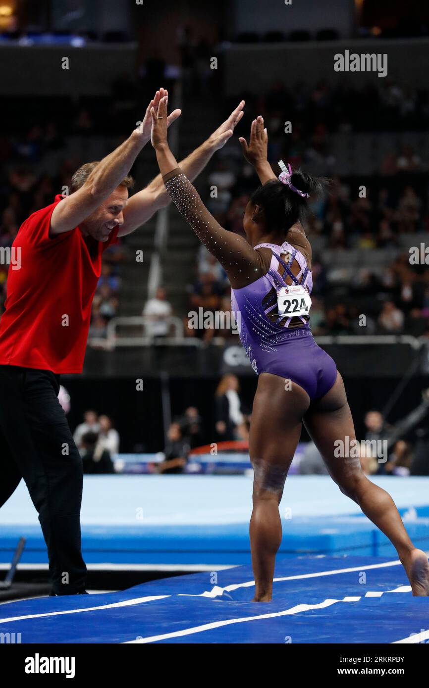 San Jose, California, USA. 25th Aug, 2023. Simone Biles (224) celebrates with her coach Laurent Landi after performing on the vault at the 2023 Xfinity U.S. Gymnastics Championships at the SAP Center in San Jose, California on Friday, August 25, 2023. (Credit Image: © David G. McIntyre/ZUMA Press Wire) EDITORIAL USAGE ONLY! Not for Commercial USAGE! Stock Photo