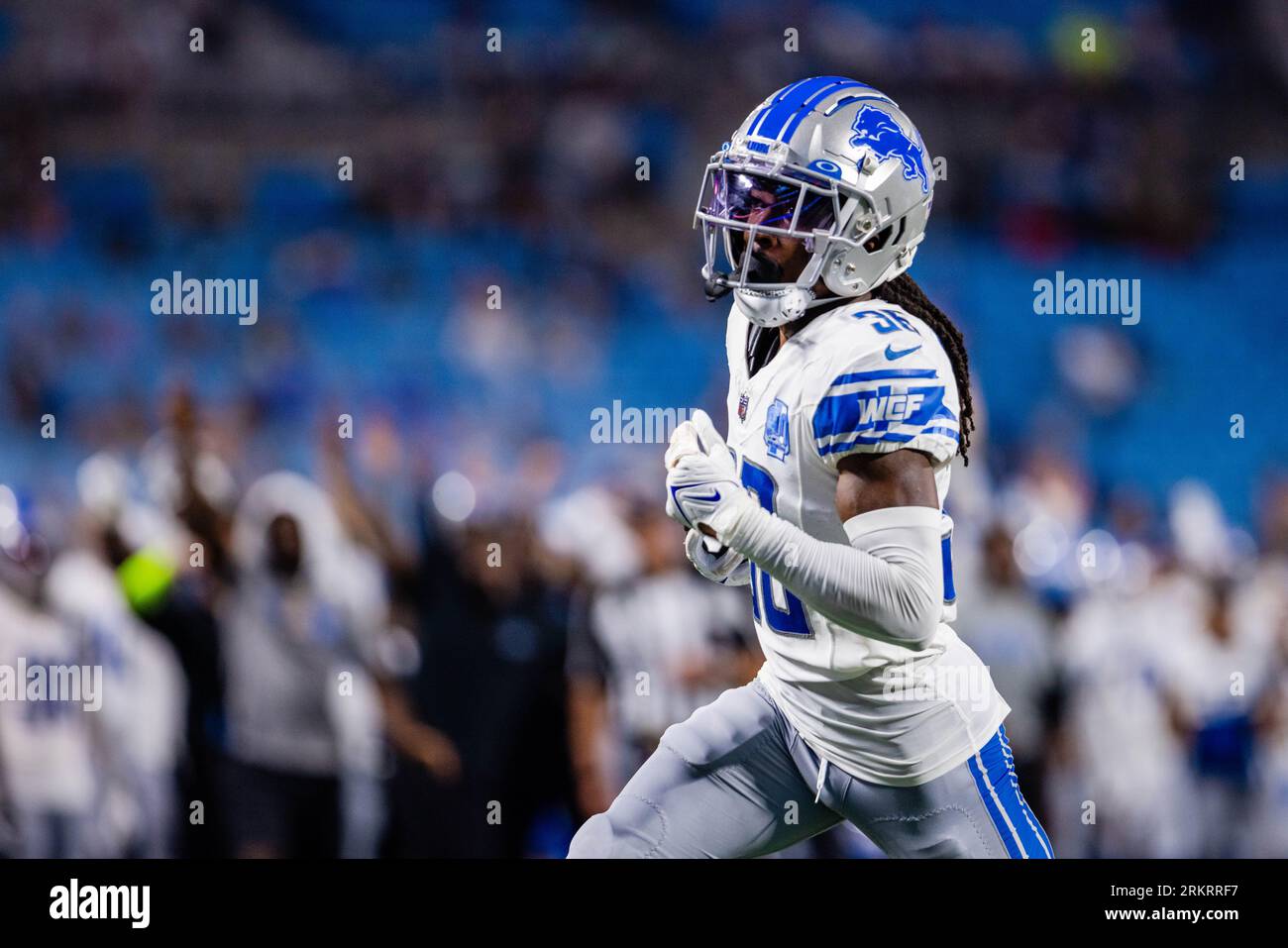 Detroit Lions defensive tackle Corey Williams (99) fires up the crowd  during an NFL football game against the San Diego Chargers in Detroit,  Saturday, Dec. 24, 2011. (AP Photo/Rick Osentoski Stock Photo - Alamy