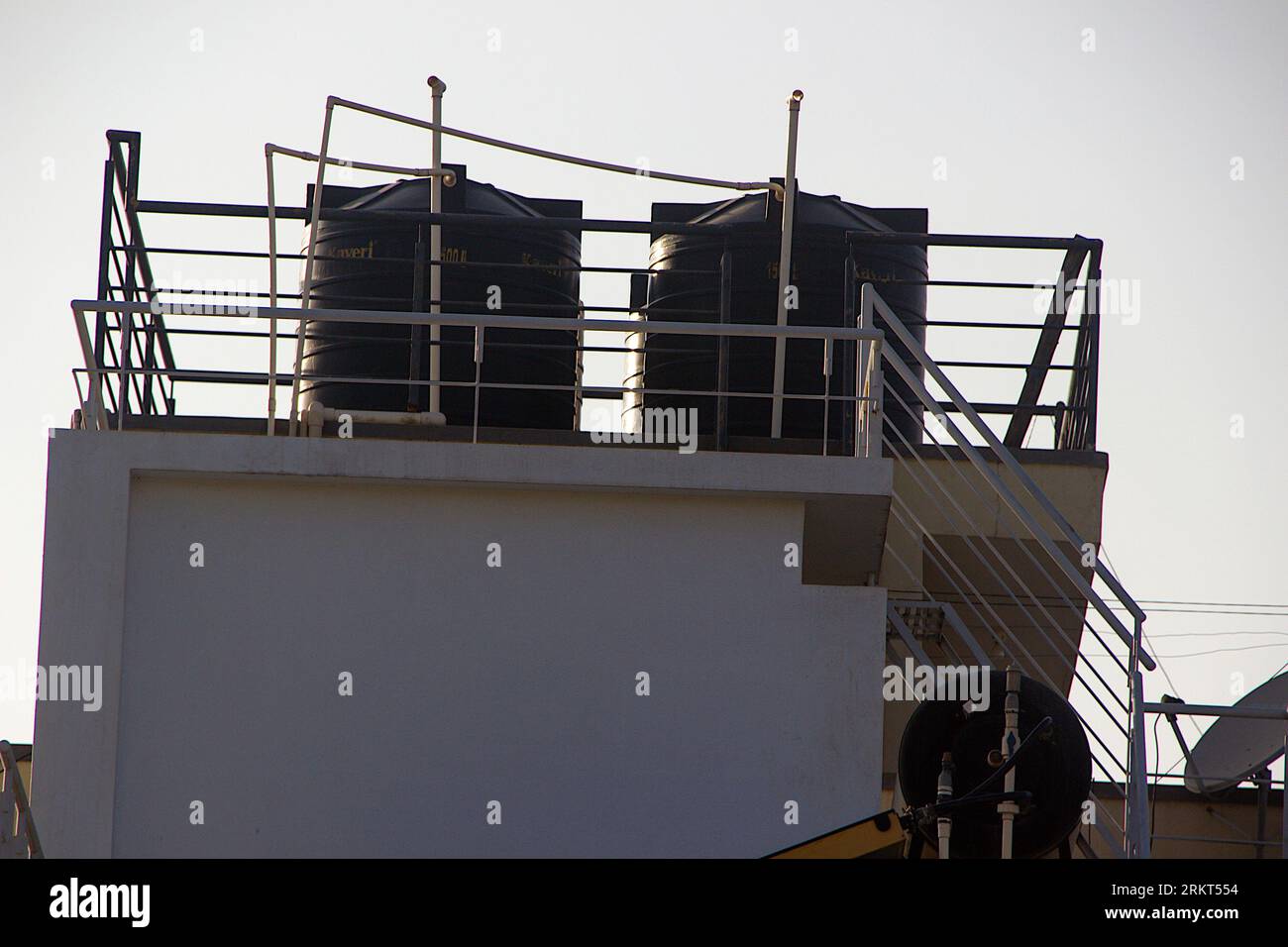 View of overhead watertanks placed on top of building for water supply