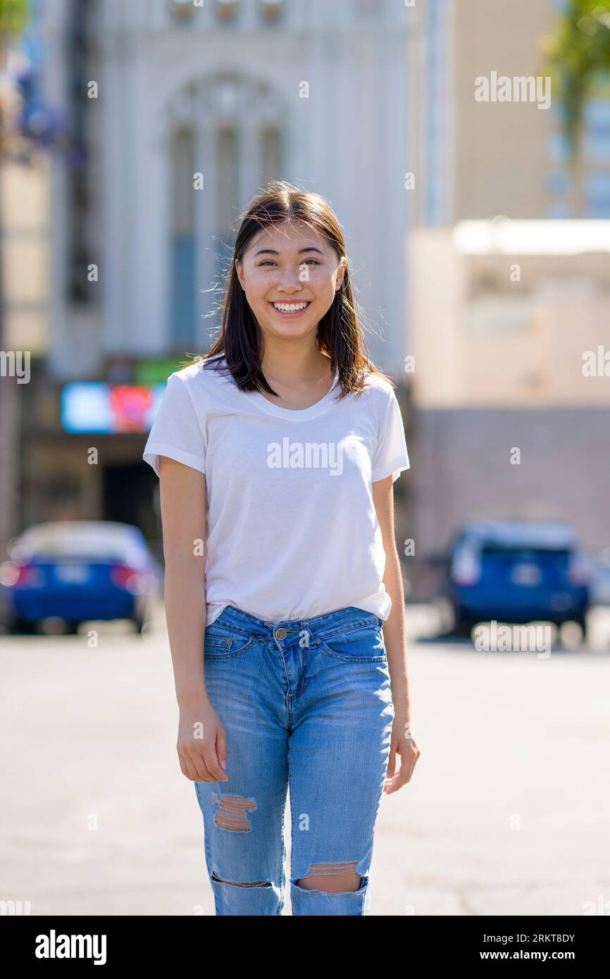 Happy asian woman outdoor hi-res stock photography and images - Alamy