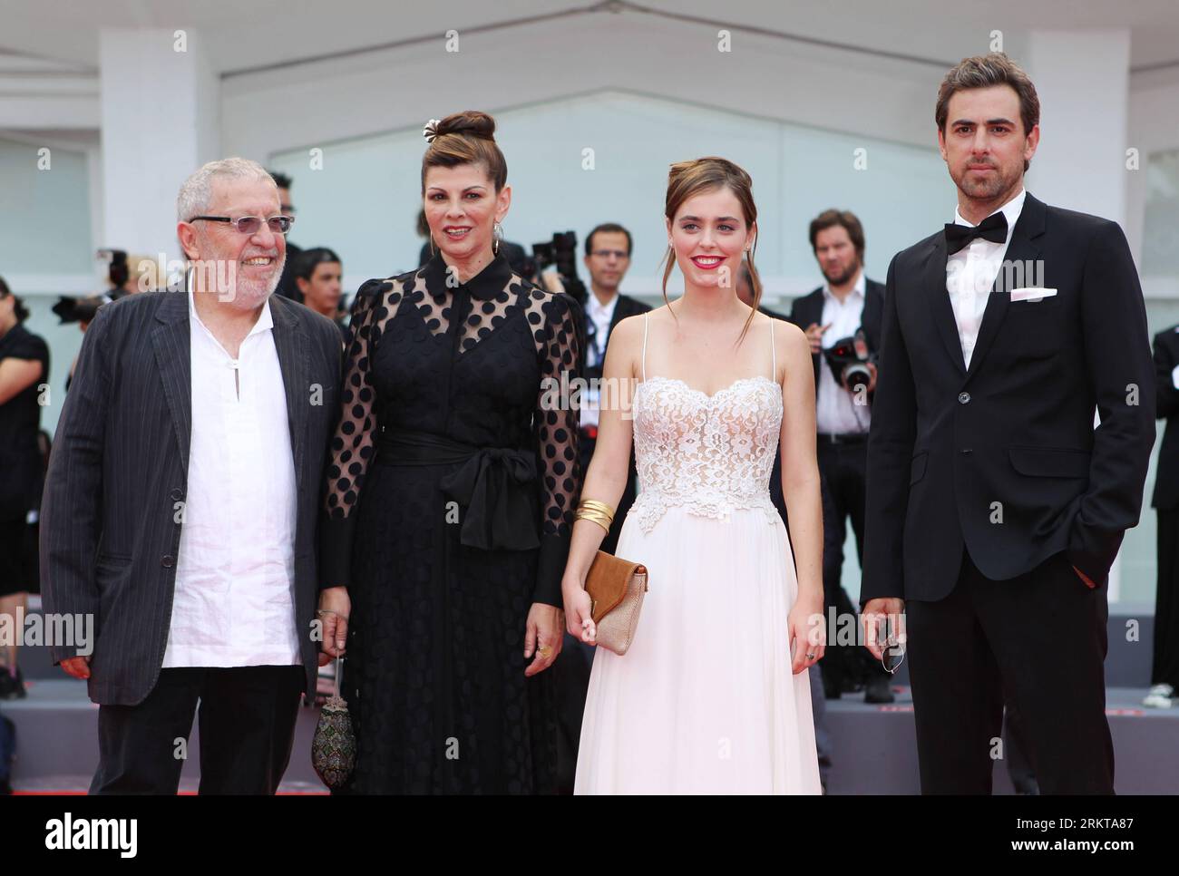 Bildnummer: 58419033  Datum: 02.09.2012  Copyright: imago/Xinhua (120903) -- VENICE, Sept. 2, 2012 (Xinhua) -- (From R to L) Israeli actor Yiftach Klein, actresses Hadas Yaron and Irit Sheleg, and actor Chaim Sharir arrive at the red carpet before the premiere of the Israeli film Lemale Et Ha Chalal (Fill the Void) at the 69th Venice International Film Festival in Venice, Italy, on Sept. 2, 2012. (Xinhua/Gao Jing) (lr) ITALY-VENICE-FILM FESTIVAL- LEMALE ET HA CHALAL -PREMIERE PUBLICATIONxNOTxINxCHN Kultur Entertainment People Film 69. Internationale Filmfestspiele Venedig Filmpremiere Premiere Stock Photo