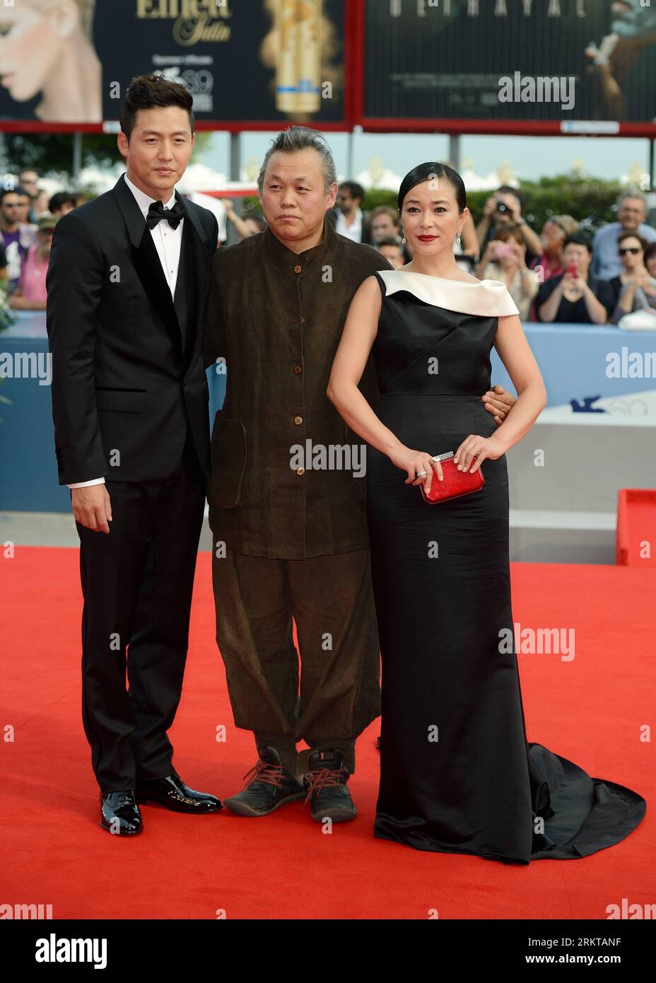 Bildnummer: 58427873  Datum: 04.09.2012  Copyright: imago/Xinhua (120904) -- VENICE, Sept. 4, 2012 (Xinhua) -- South Korean director Kim Ki-duk (C), together with cast members Cho Min-soo (R) and Lee Jung-jin, pose at the red carpet for the premiere of the film Pieta at the 69th Venice International Film Festival in Venice, Italy, Sept. 4, 2012. (Xinhua/Wang Qingqin) (jl) ITALY-VENICE-FILM FESTIVAL- PIETA -PREMIERE PUBLICATIONxNOTxINxCHN People Film Festival 69. Internationales Filmfestival in Venedig x0x xdd premiumd 2012 hoch      58427873 Date 04 09 2012 Copyright Imago XINHUA  Venice Sept Stock Photo