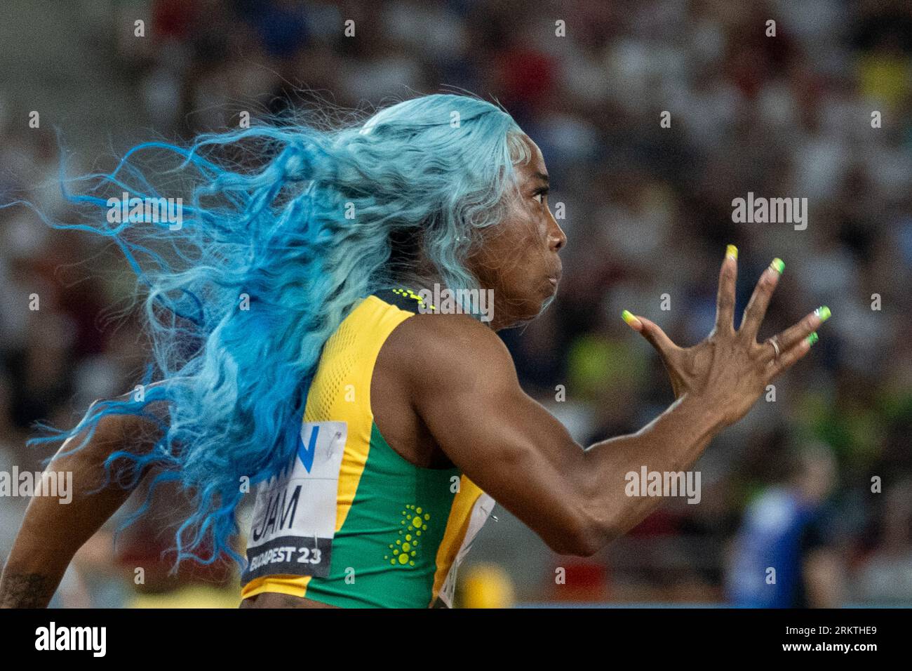 Budapest, Hungary. 25th Aug, 2023. Shelly-Ann Fraser-Pryce of Jamaica competes during the heats of women's 4X100 meters relay during the World Athletics Championships in Budapest, Hungary, Aug. 25, 2023. Credit: Meng Dingbo/Xinhua/Alamy Live News Stock Photo